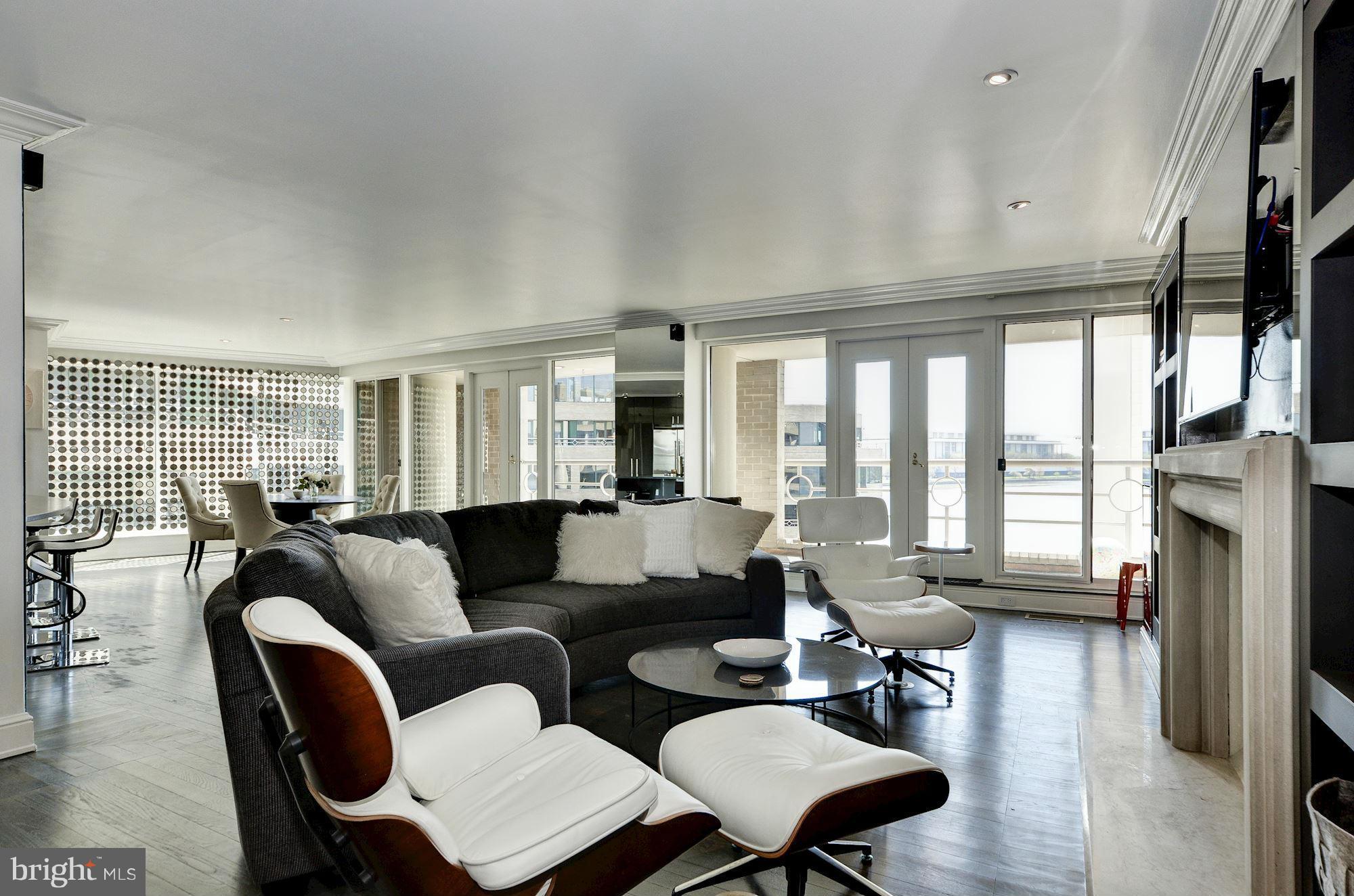 Beautiful 3BR/3BA condo overlooking the Potomac/waterfront.This stunning unit is located in the PH level of the Washington Harbor & features gorgeous h/w floors throughout, updated appliances/amenities, & features spacious bedrooms/baths.The living room, dining room, & kitchen are flooded w/ light from the floor to ceiling windows. Parking is available in the underground garage & has two spaces.
