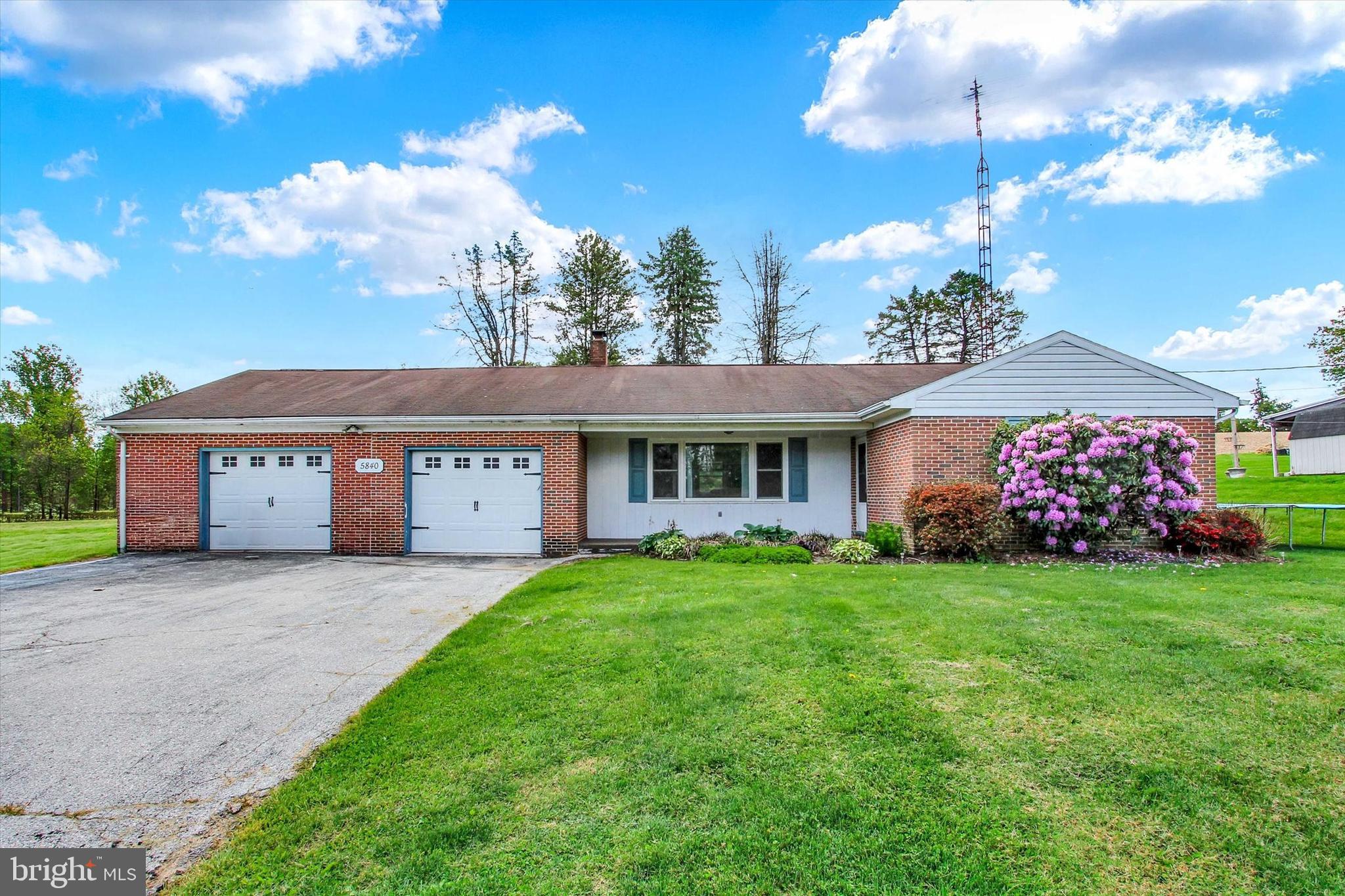 Discover an exquisite blend of comfort and elegance in this ranch style home in Spring Grove school district. This well maintained brick residence boasts 1,032 sq. ft. of refined living space, featuring three spacious bedrooms and a beautifully appointed full bathroom. The rich hardwood flooring flows seamlessly throughout, enhancing the home's warm ambiance. Lower level has an additional 500 sq.ft. of living space perfect for a rec or play room.  Enjoy the convenience of an oversized attached garage, perfect for car enthusiasts or additional storage. The expansive 0.42-acre lot offers ample outdoor space for entertaining or tranquil relaxation.  Experience the serenity of suburban living while being just moments away from vibrant local amenities.