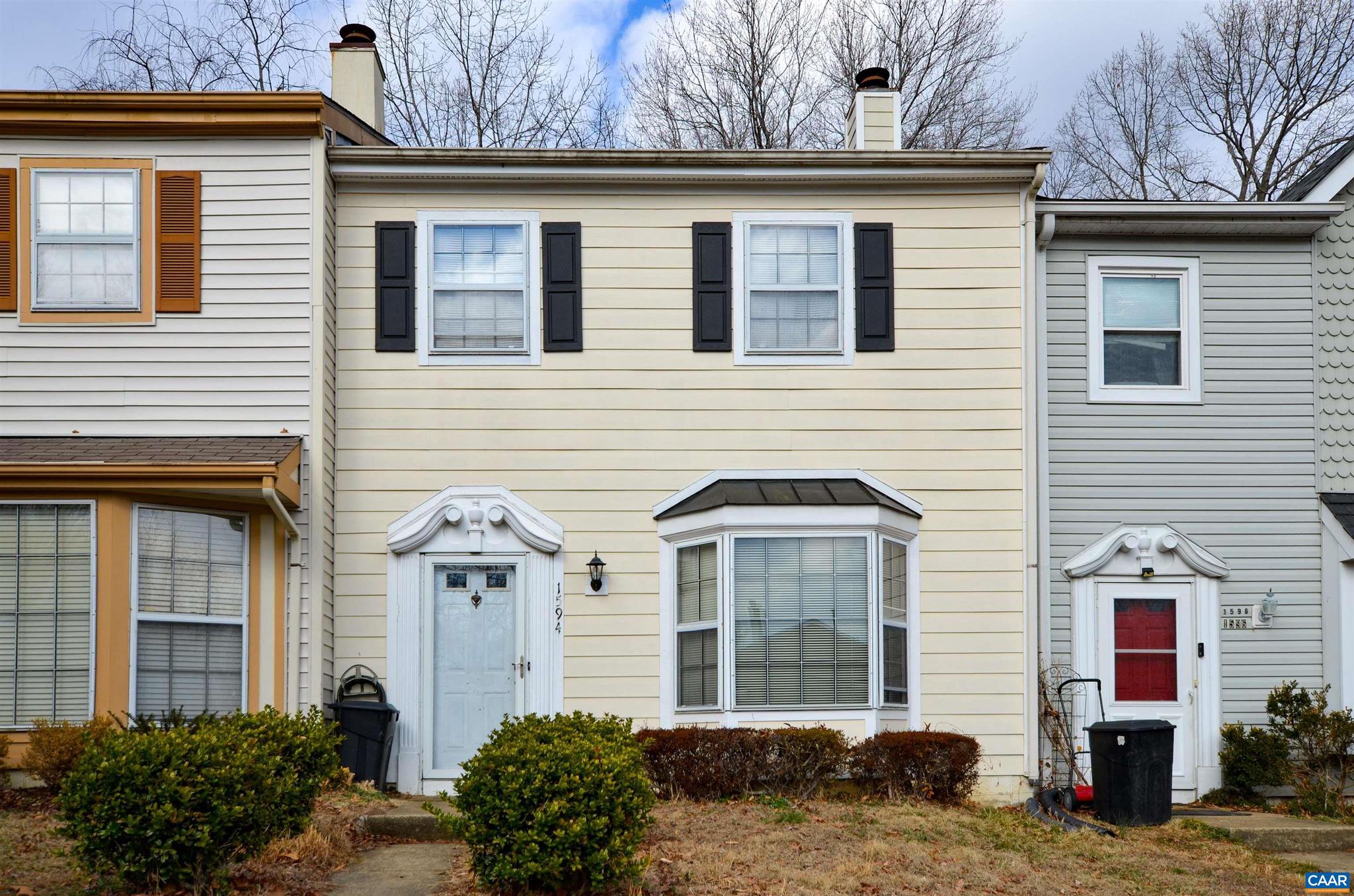 INCREDIBLE central C'ville location with fenced back yard! Move right in or add to your investment portfolio with this turnkey, highly desirable townhome conveniently located to shopping, entertainment and UVA. Main level features sunken living room with cozy fireplace, dining room, and eat-in kitchen. Convenient first floor laundry room and half bath. Upstairs features 3 carpeted bedrooms, full bath and half bath. Backyard patio and fenced in yard. Near walking trails and easy access to 250 bypass. Minutes to Stonefield Shopping Center, Historic Downtown Mall, and CHO Airport, and UVA.,Formica Counter,Fireplace in Living Room
