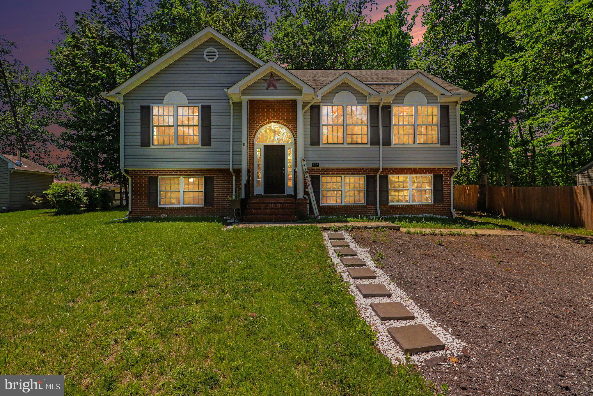 Your dream summer starts here! This beautifully maintained 4-bedroom, 3-bath home offers the perfect combination of space, style, and comfort. From the moment you step inside, you’ll love the impressive wide staircase entry, open-concept layout, and thoughtful upgrades throughout.

Recent updates include new carpet 2026, new flooring in the kitchen and all bathrooms 2023, fresh interior paint 2026, upgraded lighting, new plumbing fixtures, updated door hardware, and a brand-new HVAC system 2026. The bright and open living room, dining area, and kitchen create an ideal setup for entertaining family and friends. The kitchen features a convenient breakfast bar for extra seating and everyday gatherings.

The spacious primary suite offers a walk-in closet and private ensuite bath complete with double sinks, a relaxing jetted tub, and separate shower. Two additional bedrooms and a full bath complete the upper level.

Downstairs, the finished lower level provides even more living space with a large family room, laundry area, storage space, full bath, and a private 4th bedroom—perfect for guests, a home office, or flex space to fit your lifestyle.

Step outside and unwind on the back deck overlooking the peaceful backyard that backs to trees, offering added privacy and beautiful natural views.

Enjoy resort-style community amenities including a lake, beach, outdoor pool, picnic areas, basketball courts, tot lots, gated security, and so much more. This move-in ready home has everything you’ve been searching for just in time for summer!