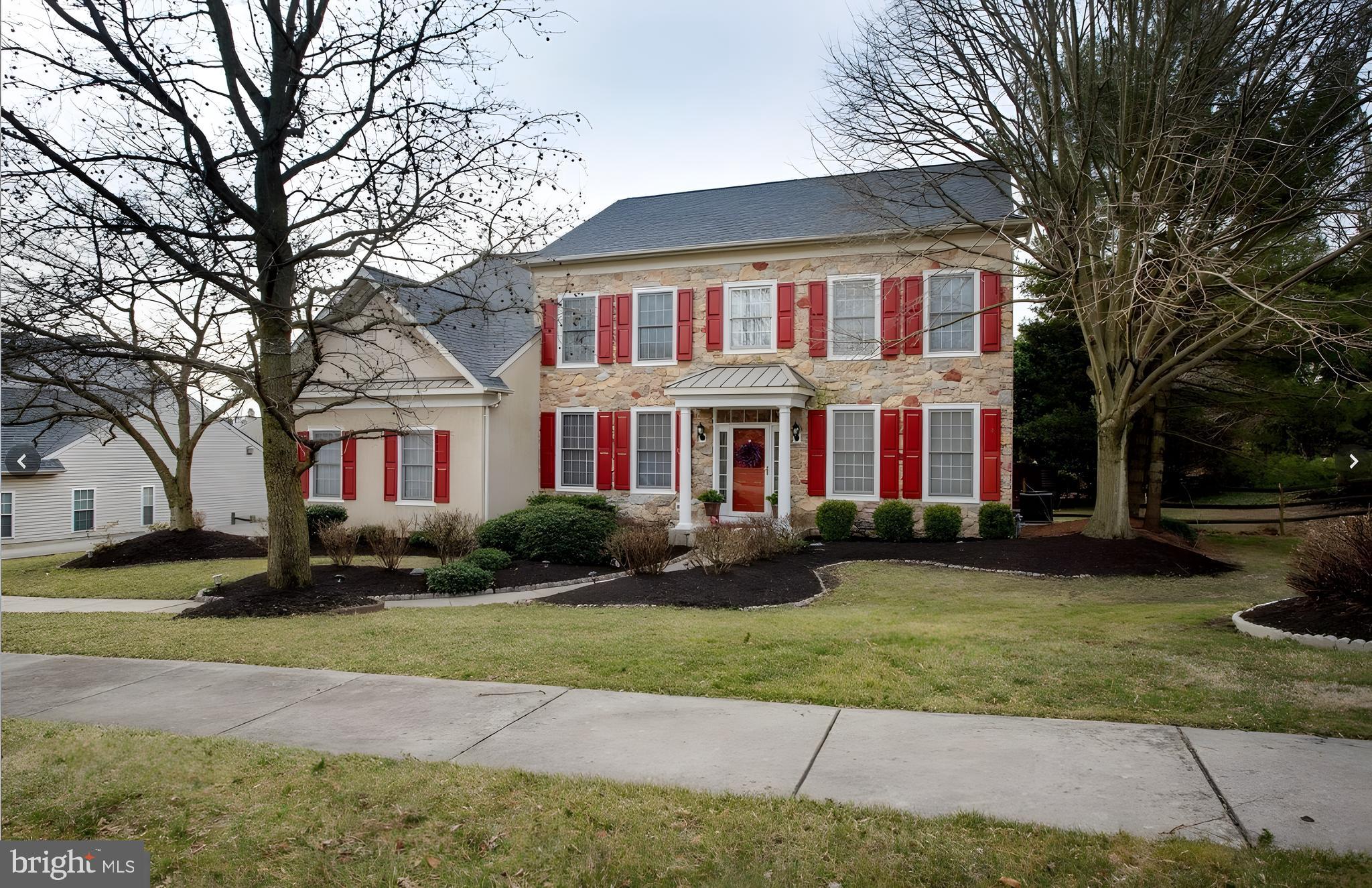 Beautifully maintained home in Newark’s desirable Woods at Louviers, offering space, light, and a prime location. Situated on a .4-acre corner lot, this property features a large backyard, spacious deck, new black aluminum fencing, and a 2-car attached garage—perfect for everyday living and entertaining.

Inside, you’ll find an open-concept layout with a bright kitchen featuring Corian countertops, center island, double wall oven, and cooktop, flowing into a stunning family room with soaring vaulted ceilings, skylight, and a floor-to-ceiling stone fireplace. The main level also includes a first-floor office, formal living and dining rooms with detailed trim work, and a convenient main-floor laundry area, all filled with abundant natural light.

Upstairs, the spacious primary suite offers a private retreat with vaulted ceilings, two walk-in closets, and an attached bath featuring a double-bowl vanity, recessed lighting, jetted soaking tub, and separate shower. Three additional bedrooms provide built-ins and comfortable layouts.

The fully finished basement expands your living space with a large recreation area, full bath with shower, and an unfinished section ideal for storage, along with convenient walk-out access with new Bilco doors. As a former builder’s model, the home showcases thoughtful design and quality features throughout.

Step outside to a spacious rear deck, perfect for entertaining guests, summer grilling, and relaxing evenings. The beautifully landscaped yard is complemented by new black aluminum fencing, offering a clean, modern look while creating a private and inviting outdoor space.

Located just minutes from Main Street Newark, the University of Delaware, White Clay Creek State Park, and Pike Creek shopping and dining, this home combines comfort, convenience, and a highly desirable location.

Smart Moves Start with Michael.
