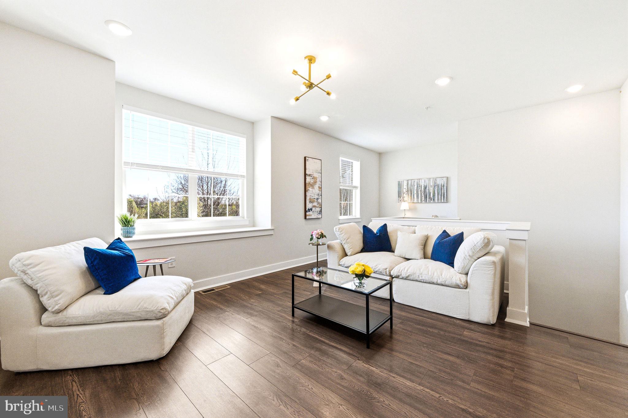 Welcome to 142-A Annapolis Street, a beautiful home in the sought-after Waterside community of Bensalem. From the moment you enter, you’re greeted by a versatile Great Room, perfect as a home office, gym, or additional living space, offering flexibility to suit your lifestyle. As you continue down the hall, you’ll find a convenient powder room, laundry area, storage closet, and access to the one-car garage, complete with a Tesla charger. Upstairs, the home opens into a bright and airy open-concept layout, seamlessly connecting the kitchen, dining, and great room, ideal for both everyday living and entertaining. The kitchen features stylish shaker-style cabinetry, granite countertops, and stainless steel appliances. The adjoining dining and living areas provide ample space for gatherings, while a cozy nook just off the family room offers the perfect spot for a home office, complete with an additional storage closet. The private primary suite offers a generous closet and an en-suite bath with granite countertops and a floor-to-ceiling tiled shower. A second bedroom has access to a full hall bathroom, providing comfort and convenience for guests or family members. Additional highlights include 9-foot ceilings and low-maintenance floating plank flooring throughout the main living areas. Located just steps from the Delaware River, this home offers easy access to I-95, Philadelphia, and New Jersey, making commuting a breeze. Don’t miss your opportunity to own in this vibrant, waterfront community!
