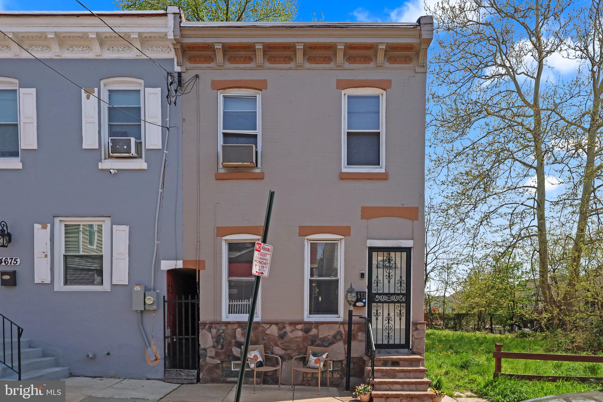 Welcome to this beautifully renovated home in the heart of Frankford, Philadelphia. Step inside to a modern living area featuring sleek gray laminate flooring and custom lighting that creates a warm inviting feel. A striking decorative stone accent wall serves as a stunning focal point, adding  texture and contemporary character to the space. The updated kitchen offers new appliances, marble design flooring, granite countertops, and a clean, modern design perfect for everyday living and entertaining. Step from the kitchen  into your laundry facility for your extra convenience. This home offer's a charming rear yard, ideal for relaxing or outdoor gatherings. The fully finished basement offers  exceptional additional living space, featuring a custom-lit stairwell ceiling, stylist barn door closets, and an elegant electric fireplace, perfect for a family room, media space, or guest area. This home blends modern finishes with comfort and functionality, making it a great opportunity for first-time homebuyers. Schedule your showing today!