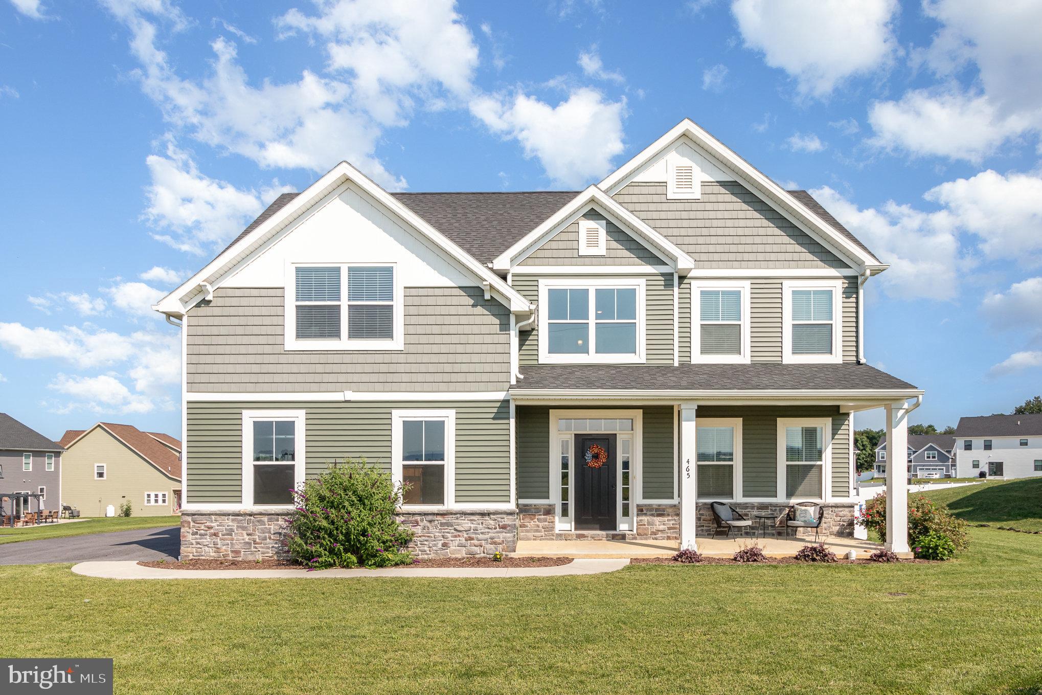 Welcome to 465 Winchester Drive, a beautifully maintained one-owner home built in 2021 and offering 2,174 square feet of thoughtfully designed living space in the desirable Grand Point Crossing community of Chambersburg. Featuring 4 bedrooms, 2.5 baths, and no HOA, this home combines modern comfort, functional living, and an exceptional location.

Situated on the largest lot in the neighborhood, this property offers additional outdoor space, privacy, and flexibility that is becoming increasingly difficult to find now that construction within Grand Point Crossing has been completed. From the moment you arrive, the inviting covered front porch and attractive curb appeal set the tone for what awaits inside.

The bright two-story foyer welcomes you into a spacious open-concept layout designed for both everyday living and entertaining. The kitchen serves as the heart of the home, offering abundant cabinetry, generous counter space, and included appliances, while seamlessly connecting to the breakfast area and family room. A separate dining room and convenient half bath complete the main level.

Upstairs, you'll find four generously sized bedrooms, including a spacious primary suite featuring a tray ceiling, sitting area, walk-in closet, and private bath with dual vanities and a soaking tub. A second full bath and upper-level laundry room provide added convenience for daily living.

The unfinished basement offers excellent storage and endless possibilities for future expansion, whether you envision a recreation room, home office, gym, or additional living space. Outside, enjoy relaxing or entertaining on the backyard patio beneath the included pergola while taking advantage of the expansive yard.

Conveniently located near parks, walking trails, shopping, dining, and commuter routes, this home offers the perfect balance of neighborhood charm and everyday accessibility. With modern construction, pride of ownership throughout, and one of the most desirable lots in the community, 465 Winchester Drive is a rare opportunity you won't want to miss.