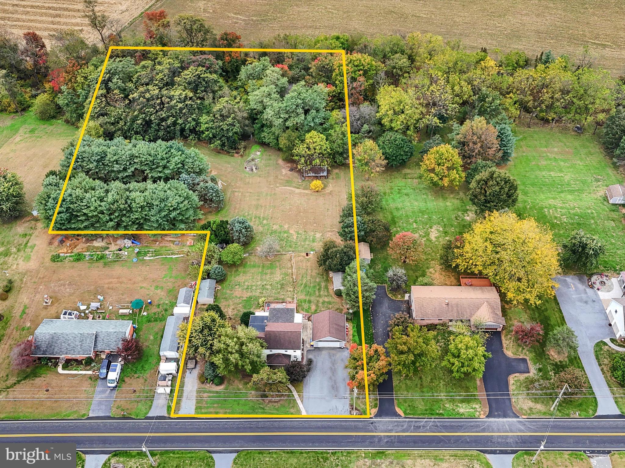 PRICE REDUCED! MOTIVATED SELLER! 2.5 story farmette/farm house with 2.8 acres in Rapho Twp.!!! This Owner has many years to know this property and is a wealth of information.  A bit of a sweet & sour decision to sell, please be open minded as Owner has a bit of struggle with the upkeep. Bought in 1990 originally and raised 8 daughters here, this is a one of a kind older farmhouse. SOLD AS IS! 2 story addition built on in 1992-1993 includes the kitchen and the 5th BD above. And patio/deck in the rear of the home. Added the full bath / laundry on the main level in 2016 and used the room on the left of the LR/DR/Foyer as 1st floor BD to accomodate health reasons. Oil hot water baseboard heat and some rooms are gravity heated or electric portable heaters & coal stove stays! Their is a springhouse that shelters the spring fed water supply with a new submerged pump by Benjamin Franklin this year and a new water tank and pump in 2024. New hot water heater in 2024.
On site septic and we will hopefully be able to wait to pump it until we know if the new Buyer wants to test the system. Must be pumped approx every 4 years(??),....Roof is approx. 20 years old per Owner.
2 car oversized garage built in 2015  with a 200 AMP service. The Owner has a landscaping business and needs to park equipment in this garage and has an area to the left of the home for parking truck, trailer and other equipment also.  2 sheds, springhouse and great neighborhood!
The rear acreage is all fenced. The pine trees to the left in the rear were all seedlings and now is a small forest. The owner has 2 sheep now. She had horses in the past.  I am told that 3 horses, 7 sheep & 30 chickens are allowed. Please confirm with Rapho Township!  Gorgeous piece of property! SOLD "AS IS"!!