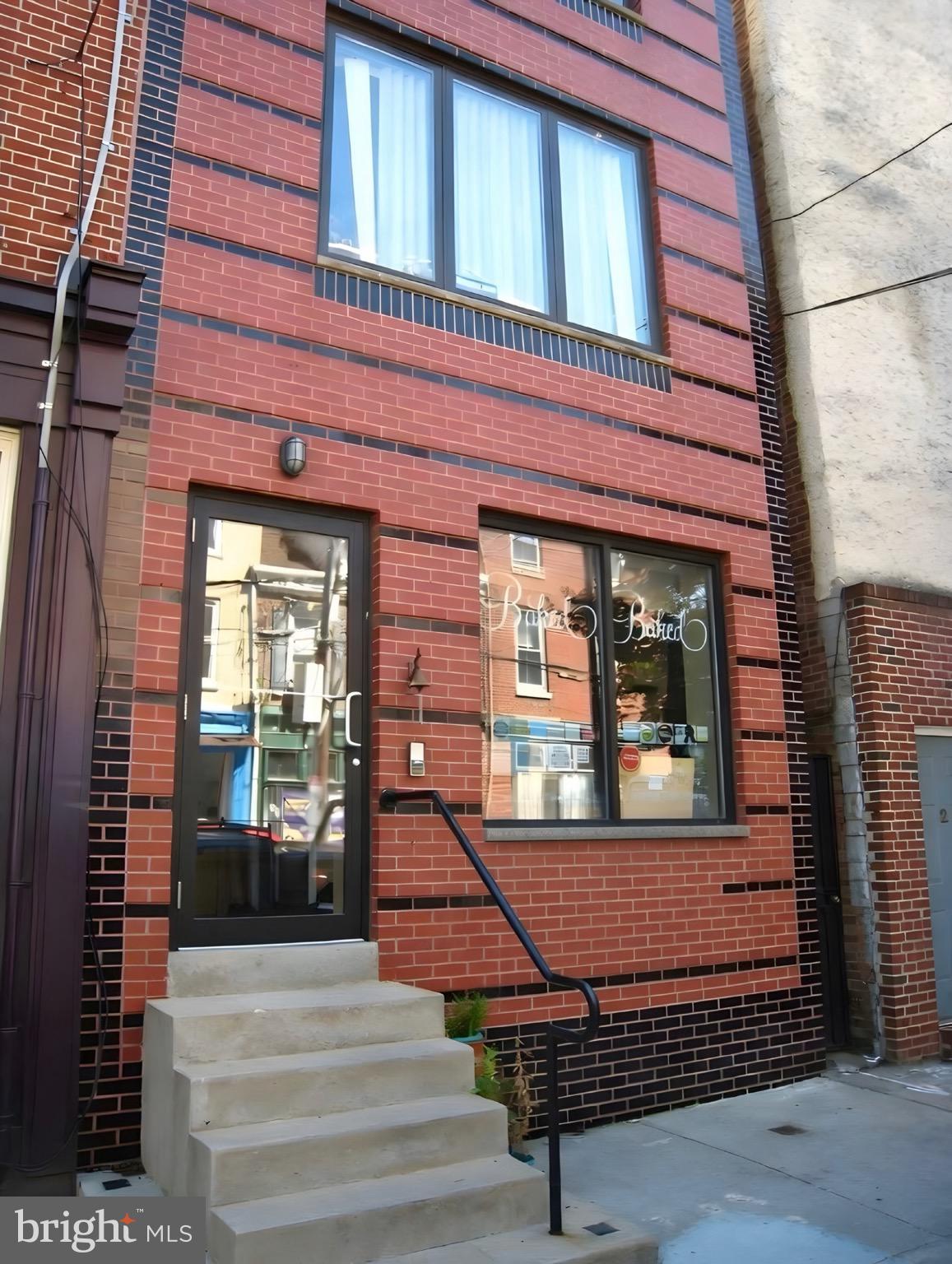 Mixed Use Property in sought after Queen Village! Fabric Row! 2 Commercial Spaces &
 2 Newer 1 Bedroom Apartments. Built from the ground up with Concrete Block. 1st Floor & Basement - Commercial Space with Large Open Floor Plan, Mable Floors, Full Bath & Private yard (would make a nice professional office). 2nd & 3rd Floor -  2 Large, 1 Bedroom Apartments with Hardwood Floors and New Kitchen. All are Self Contained.