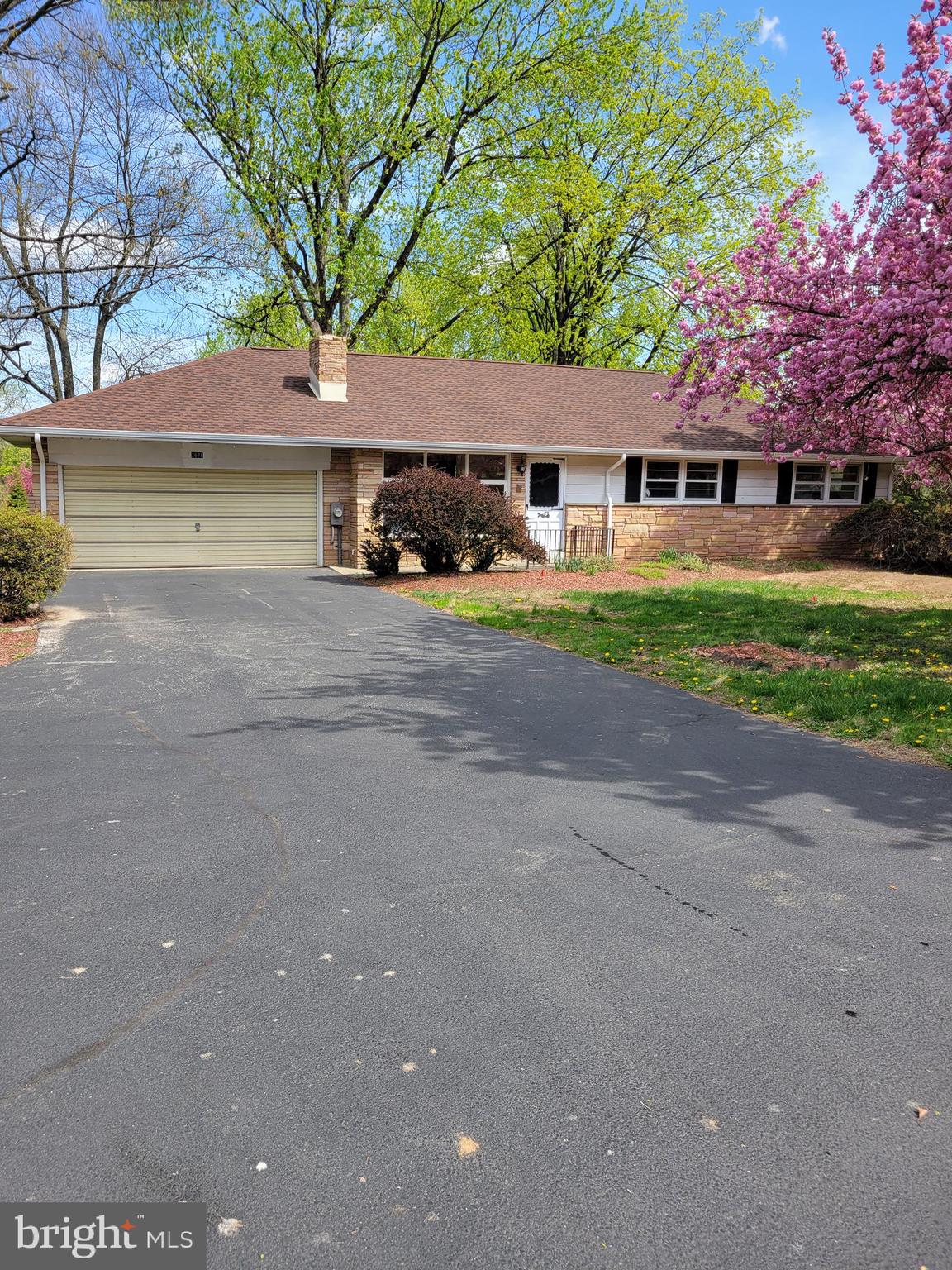 This is not a pet friendly property.  This awesome 3 bedroom/1 bath ranch home has a lot to see.  From the beautiful flowering trees in spring to the huge, flat, fenced in backyard.  Enter through the front door and you will be greeted by an oversized Living Room/Dining Room combination room.  From the front door, you can see all the way to the backyard.  Lots of potential uses for this area.  There is a Kitchen directly next to the Dining Room and it has been updated and has an awesome breakfast bar/island for an eat in kitchen.  Head down the hallway to find the Bathroom which has double sinks and has a surround tub/shower unit, it is a nice sized bathroom.  The Bedrooms all have carpeted floors and are all nice sized.  Primary is the one in the front farthest down the hallway.  Downstairs you will find a finished section of the basement that has an oversized Family room.  The fireplace is decorative only and does not work but adds a lot of character to the room.  There are storage cabinets and a sink for entertaining.  Next to the Family room you will find a workshop/storage area that has egress to the back of the home.  You aren't done yet... Back upstairs to the left of the Dining room is access to a private office completed separate from the house and the storage space in front of that is for a motorcycle, bikes, lawnmowers etc. but is not a full 2 car garage.  Do not forget to stop out back for a great backyard and several decks and levels of decks for amazing entertaining outside.  NO PETS!  This is a month to month lease.