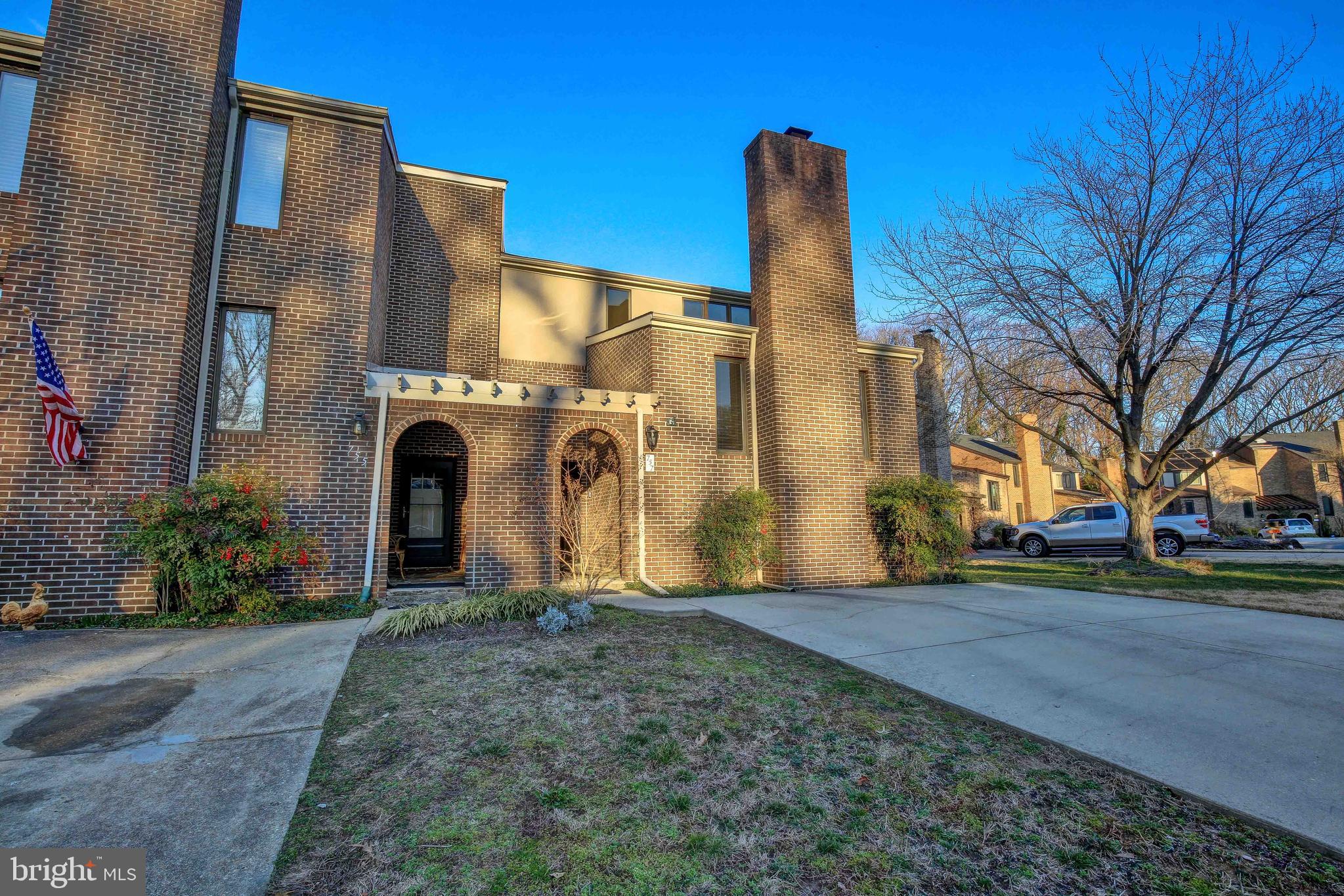 You will be the envy of your your friends when they come over and see your gorgeous, classic, all brick home.   As you walk through the front door with glass inset, you'll notice this is not your average home.  This is something special!   Tile flooring greets you on this level then you walk towards the split staircase to the main level, which welcomes you with it's open floorplan and hardwoods.  In fact, there is no carpet in this house, only easy-to-clean, low maintenance flooring.  The great room is lit up with recessed lights on dimmers along with lots of natural light that comes in through the 2 glass doors and windows.   The wood fireplace is at the center of the room between the doors that lead out to the deck. Incredibly spacious, there's plenty of room for entertaining.   The remodeled kitchen, located in the front of the home  features all of the accoutrements that you'd expect in a well-appointed gourmet kitchen:  Stainless appliances, yards of granite counters and a stand-alone island with slide-in Jennair range.   The best part about the kitchen is how it extends into another gathering space in front of the second fireplace on this level.   Long front windows feature built-in blinds, and there's an extra bay window to the side to grow your fresh herbs.  Going upstairs, you'll see stairwell features a well-placed skylight that brings more natural light into an already light and airy environment.  The Master Suite in the corner has plenty of windows and an en-suite bath, fully remodeled with lovely decorative tiles.  The walk-in closet is off the bathroom.  There are two more bedrooms on this level, another full bathroom and lots of closet space.  Your lower level is also finished and spacious.  The space flows nicely from the open staircase and is super cozy.  The 3rd fireplace is on this level to keep you cozy on chilly evenings.  Full glass doors walk-out onto your patio and out to the large yard with privacy fencing.   Just about everything in this entire home has been remodeled within the last 2 years and it shows, incredibly lovely and absolutely move-in ready!  Oh and the neighborhood - for starters you have private beach privileges.  The house is located in a cul-de-sac so there's no through traffic, and right up the street is a new basketball court, tennis court and fields for fun.   Hungry?  You can WALK to a variety of restaurants including Adams Ribs, Thai, Crepes, Gary's Grill taco bar, cake shop and  Coffee ; then there's salons, antique shops, consignment store and more.  Live like you're on vacation!