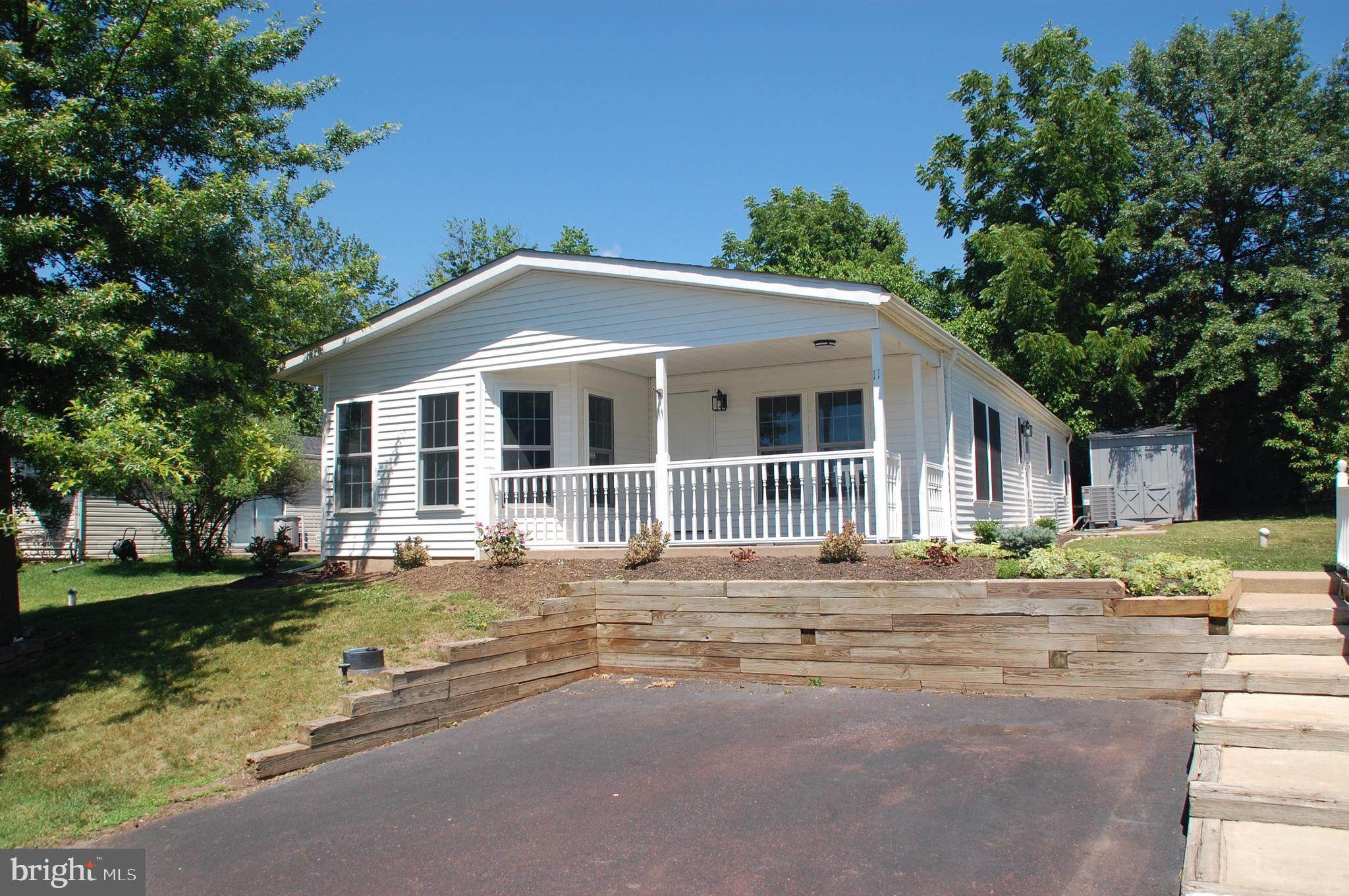 It you are looking for a home in the popular Hidden Springs 55+ community where the heavy lifting has been done for you, you’ve found it!  Extensive renovations have just been completed.  Energy Star, double hung, tilt- in windows installed throughout.  The home inspector was impressed with the quality of these units.  This was a full tear window replacement process allowing frame repairs to be completed where necessary.  New siding was installed together with a new front door and Laundry Room storm door.  New paint on the covered front porch (13’ x 9’) and shed (8’ x 8’).  New roof in 2021.  More of the same inside!  Entire interior was just painted – ceilings, walls and trim.  New Kitchen with Shaker-style soft-close cabinets and drawers plus Pantry cabinet.  New GE Energy Star oven with convection cooking, new Bosch range hood vented outside, and new Bosch 300 series 3 rack dishwasher (all are stainless steel).  New brushed nickel ceilings fans (with remotes - all but one) and light fixtures throughout.  Stylish new vanities, mirrors and medicine cabinets in both Bathrooms, and there is a new comfort toilet in the Primary BR Bath.  Beautiful new floor coverings throughout: LVP in Kitchen, Bathrooms and Laundry Room and quality carpeting in the remaining rooms.  But wait, there’s more!  New Ducane heat pump (inside and outside units) plus a new Bradford White water heater.  The duct work has been professionally cleaned.  There’s a lot of new here!  Come check it out.  You won’t be disappointed!