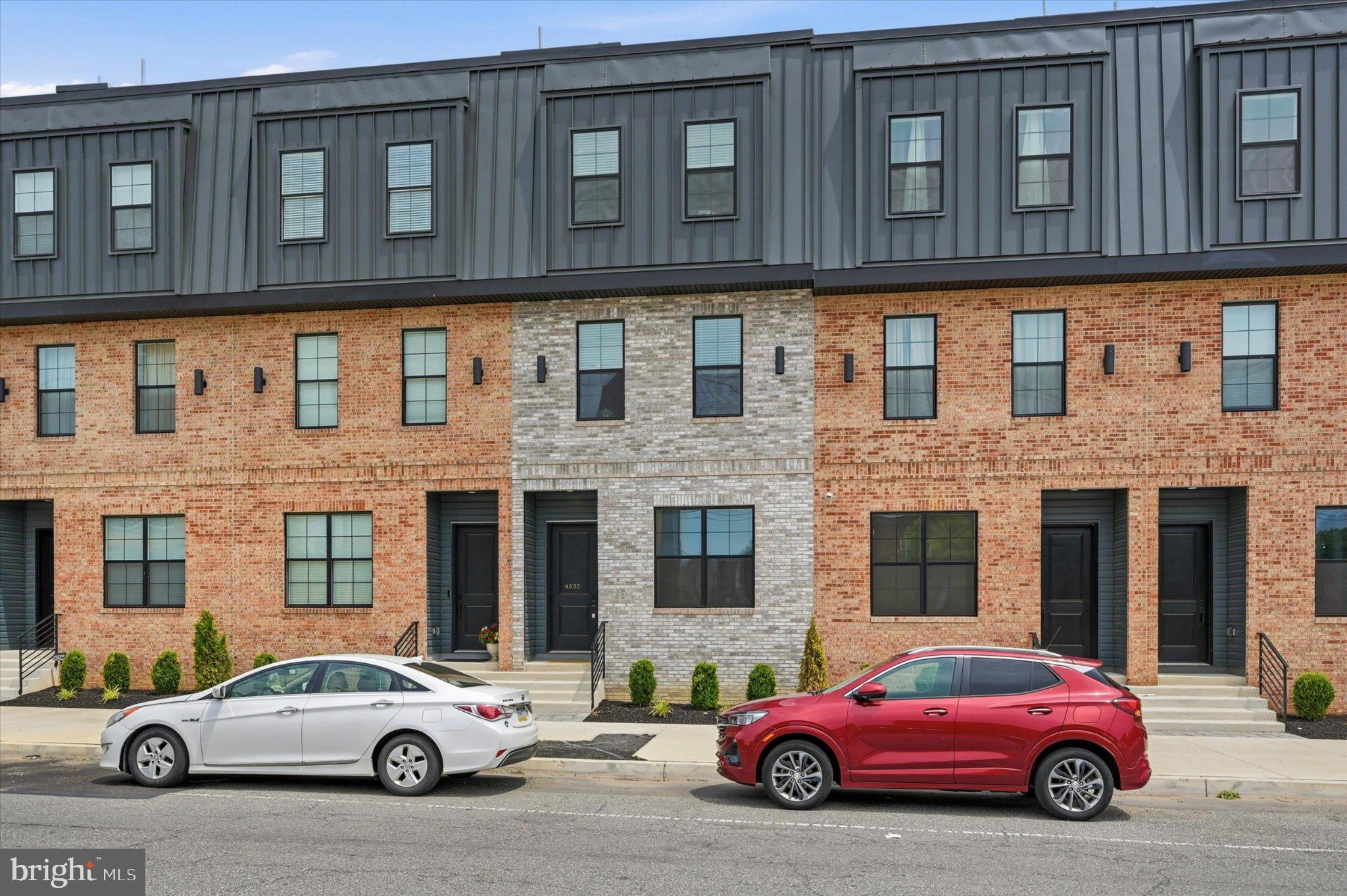 Welcome to this stunning modern townhome in the highly sought-after, sold-out Wynnefield Heights Square community. This beautifully designed 3-bedroom, 3-bath residence offers 2,219 square feet of contemporary living space with premium finishes throughout.

The open-concept main level features a chef’s kitchen with quartz countertops, a large center island, 42" cabinetry, under-cabinet lighting, GE stainless steel appliances, and engineered white oak flooring. The first floor offers a flexible bedroom and full bath—perfect for guests or a home office—plus access to the attached 1-car garage.

Retreat to the upper level featuring a spacious primary suite with dual closets and a luxurious en-suite bath with double vanity and frameless glass shower. Enjoy outdoor living with a private balcony and an incredible rooftop deck showcasing city views.

Conveniently located near Manayunk, Center City, top universities, and hospitals, this rare opportunity offers luxury, convenience, and modern city living in a sold-out community. Schedule your private tour today!
Current owner was re-located for work and has to move after only a couple months.  This home has all the perks of New Construction with a Builders Warranty and confidence the property was moved into and everything has been completed paying attention to every little detail.  This will be the last townhome available with Ford Rd access and secure garage parking.