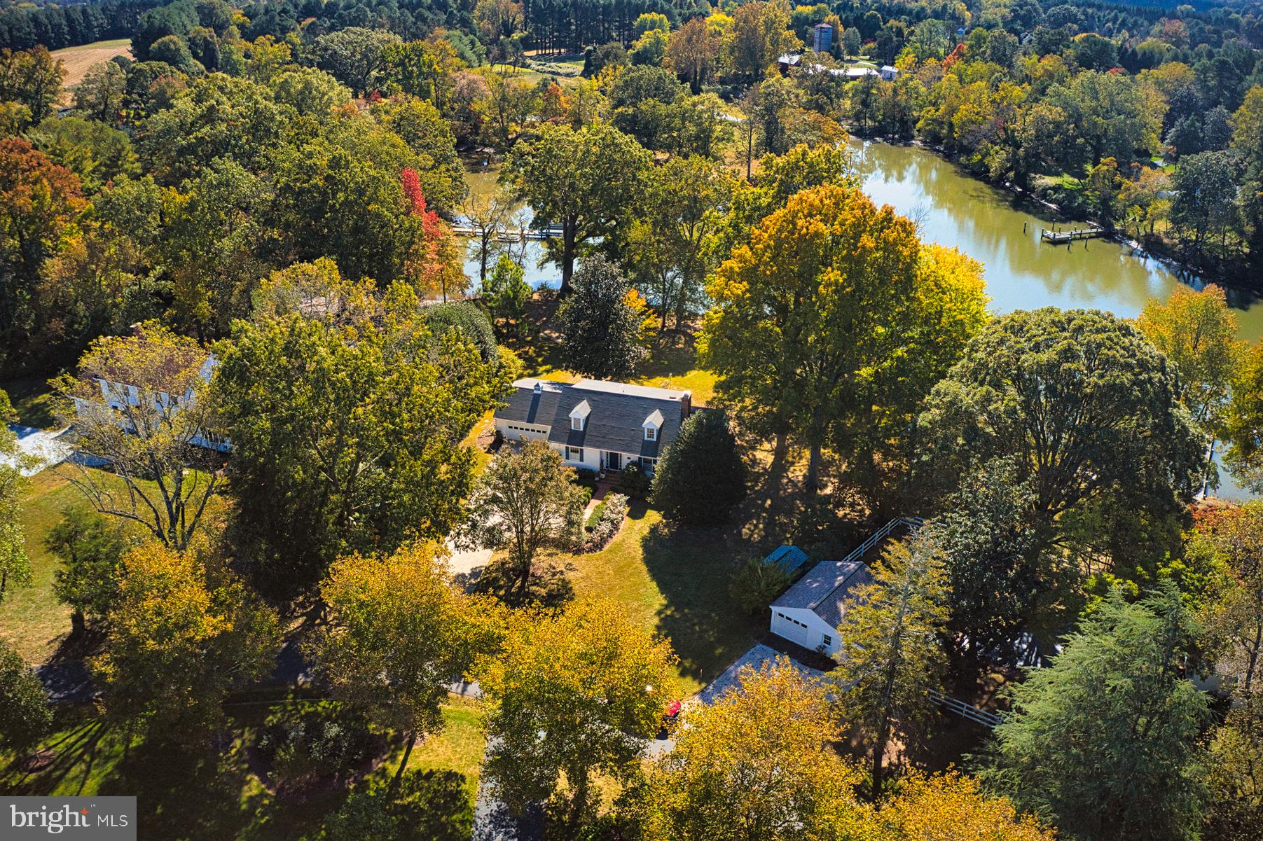 COVENIENTLY LOCATED JUST 3 MILES  DISTANCE FROM THE TOWN OF EASTON. THIS COMFORTABLE 3 BEDROOM 3 BATH WATERFRONT HOME IS CONNECTED TO PUBLIC SEWER AND THERE IS  SPACE FOR A WATERSIDE POOL.
RENOVATED BATHROOMS AND NEW KITCHEN , HUGE WATERSIDE DECK FOR COMFORTABLE OUTDOOR LIVING. THERE IS A ONE CAR GARAGE, A SHED , GRAVEL DRIVE WITH ADDITIONAL PARKING. THE DOCK FEATURES A FLOATING DOCK FOR THE AVID CAJAK ENTHUSIAST TO ENJOY GROCLEYS COVE  WHICH IS A TRIBUTARY OFF THE MILES RIVER.
SURVEY AND POOL DRAWINGS ON FILE.