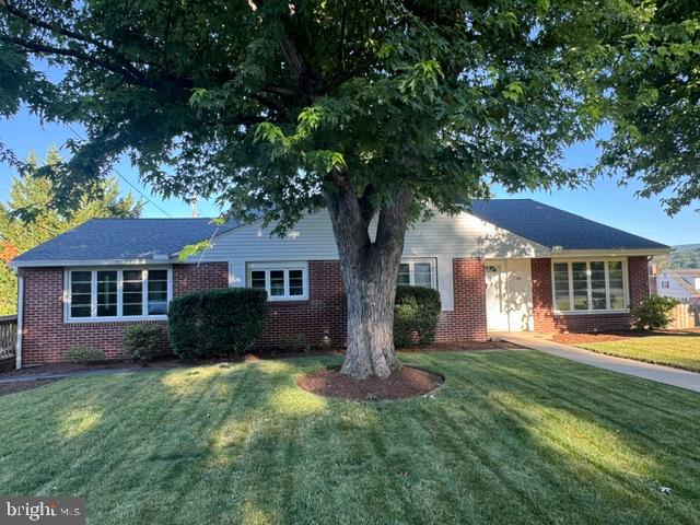 Well maintained, brick, split-level(front to back) in a great neighborhood close to schools, athletic fields and open space. Enter the front door to an open foyer area with a large carpeted living room. The dining room has hardwood flooring and leads to the spacious kitchen, with oak cabinets and built-in appliances. An addition off the kitchen provides for a large dining room or great room, with doors to an open deck area. An updated half bath completes the main level. In the upper level are 4 bedrooms(1 captive) and 2 full baths.  1 bedroom has built-ins and would make a great office/den. 
The lower level is daylinght to the rear and contains a huge family room with brick fireplace and built-ins, a laundry room complete with basic bath fixtures, a mechanical room  and an oversized 1 car garage.  The basement level has several spaces for storage and a partially finished room. There is plenty of parking including on-street, rear concrete driveway and the integral garage. The yard is fenced at the rear to protect pets and/or children. A small garden shed will house tools, mower, toys, etc. The front of the property features majestic shade trees, newer concrete sidewalks and great curb appeal. Heating and cooling is provided by multiple sources including a Bosch heat pump, Natural Gas forced-air furnace and some electic baseboard heat. Dometic hot water is supplied via an economical tankless natural gas water heater.