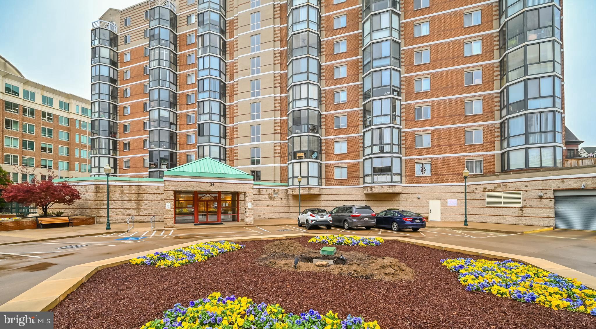 Absolutely stunning  condo completely renovated in the heart of Rockville Town Center.  Welcome to The Victoria Condominium, a charming mid-rise apartment that perfectly blends comfort and convenience. This inviting , rare, 1 bedroom,  1 bathroom, 1 Den unit offers  well-designed open concept living space, ideal for those seeking the convenience of downtown Rockville.  This wonderful unit has been completely renovated with fresh paint throughout, new carpeting, new finished hardwood floors,  all new fixtures, new outlets, switches, vent covers, 13 recessed lights and so much more.  Gorgeous kitchen with upgraded blue pearl granite counters, new backsplash, faucet and upscale stainless-steel appliances.   Cabinets have soft close doors and drawers and undercabinet motion sensor lighting.  Living and dining combo has newly finished hardwood floors and new lighting.  Rare den with French doors and new recessed lighting.  The bedroom has plush carpeting with new blinds, a Casablanca ceiling fan and a large walk-in closet with custom California Closet built ins. The full bath has beautiful ceramic tiles, a large walk-in shower, new vanity, mirror, lighting and a convenient, stackable high end Bosh washer/dryer.  The sunroom has new carpeting with beautiful custom plantation shutters and ceiling fan.  The brick-front architecture exudes timeless appeal, while modern amenities ensure a hassle-free lifestyle. Take advantage of the fantastic community amenities, including a well-equipped exercise room, secure entry, and reserved, secure parking (space #121 on level G2).  The parking space is super convenient and located just a few spaces from the elevator. Located less than a mile from Rockville Metro Station and bus service, commuting is a breeze. Experience the vibrant lifestyle this property offers; with everything you need just moments away.  Don’t miss the opportunity to make this delightful apartment your new home!