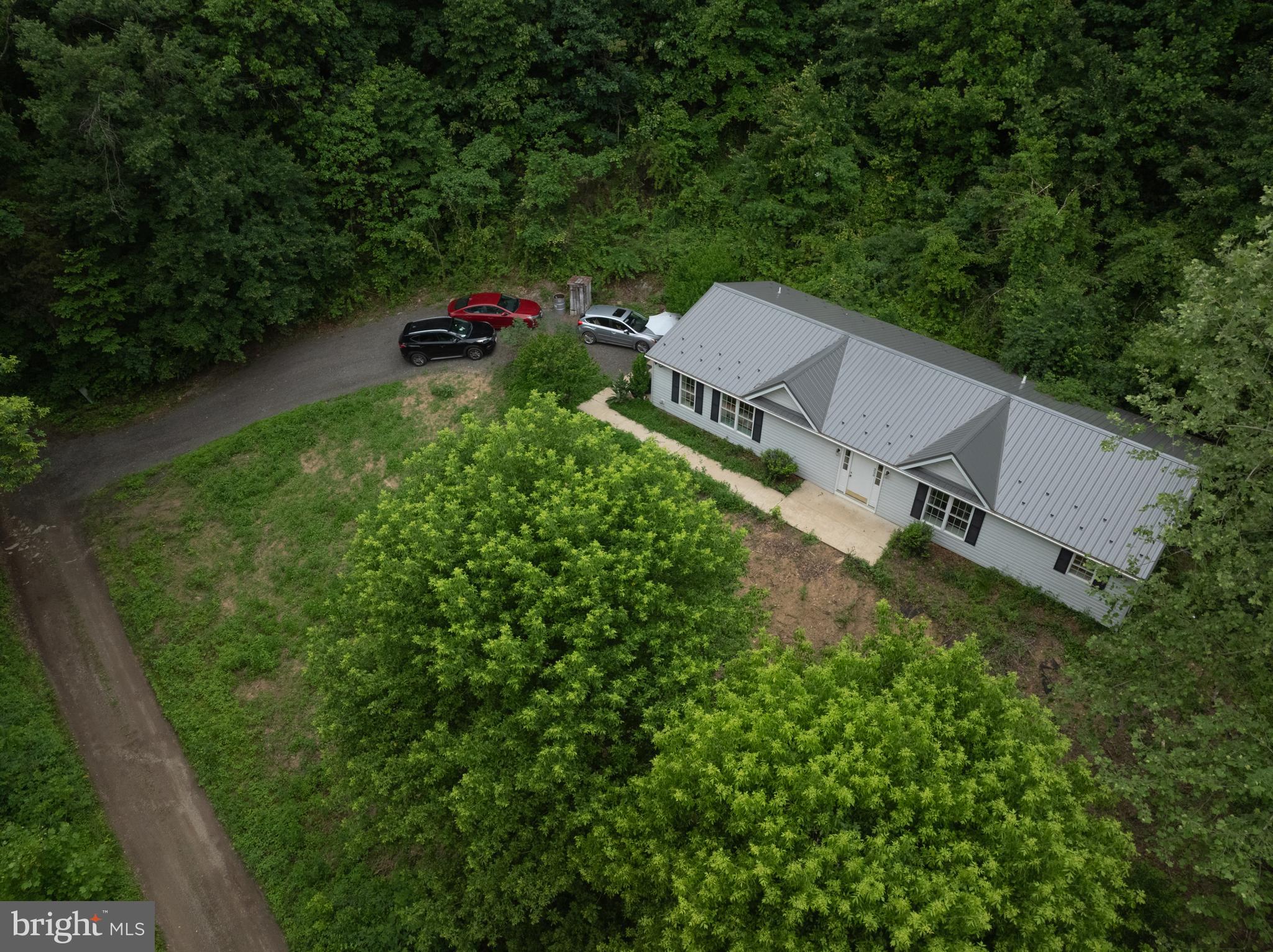 Charming 3-Bedroom Ranch Home with Private Creek Oasis.

Discover peaceful country living in this inviting single-family ranch home, nestled in the desirable Susquehanna Trails neighborhood of Peach Bottom Township. Built in 2007, this well-maintained residence offers 1,674 square feet of comfortable living space on a generous 0.91-acre lot, providing plenty of room to relax and enjoy nature.

Key Features:
Large Andrew Wyeth style picture windows and neutral color scheme throughout. 3 spacious bedrooms and 2 full bathrooms. Open floor plan perfect for everyday living and entertaining. Wood floors in the living, family and dining area. Brand new roof, new HVAC system, new kitchen range, and many other recent updates for peace of mind and efficiency. Private creek on the property — enjoy the soothing sounds of water and abundant wildlife right from your backyard. Privacy and seclusion in a serene, wooded setting. This single-level ranch layout offers easy, one-floor living with modern amenities and a functional design. The expansive lot is ideal for outdoor activities, gardening, or simply unwinding in your own slice of Pennsylvania countryside.
Location Highlights: Located in Delta, PA (ZIP 17314), just minutes from the PA/MD line. Enjoy convenient access to local amenities while maintaining a quiet, rural atmosphere. The area is known for its natural beauty, outdoor recreation opportunities, and friendly community feel.