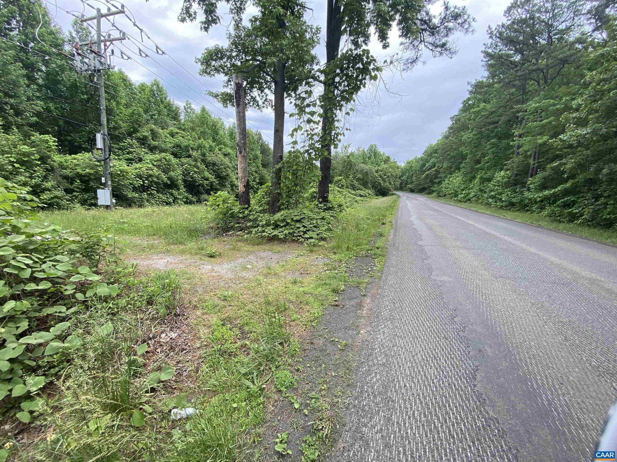 Nearly 5 acres along Davis Hwy/RT 22 in Louisa County between the towns of Mineral and Louisa, just minutes away from downtown Louisa and all of its crucial county and commercial facilities. This is a long lot that runs along the north side of 22, between the road and the Buckingham Branch Railroad tracks, with a portion that spill over 22 on the eastern side of the property.   The larger side (North of 22) has perked for a 2 bedroom home.