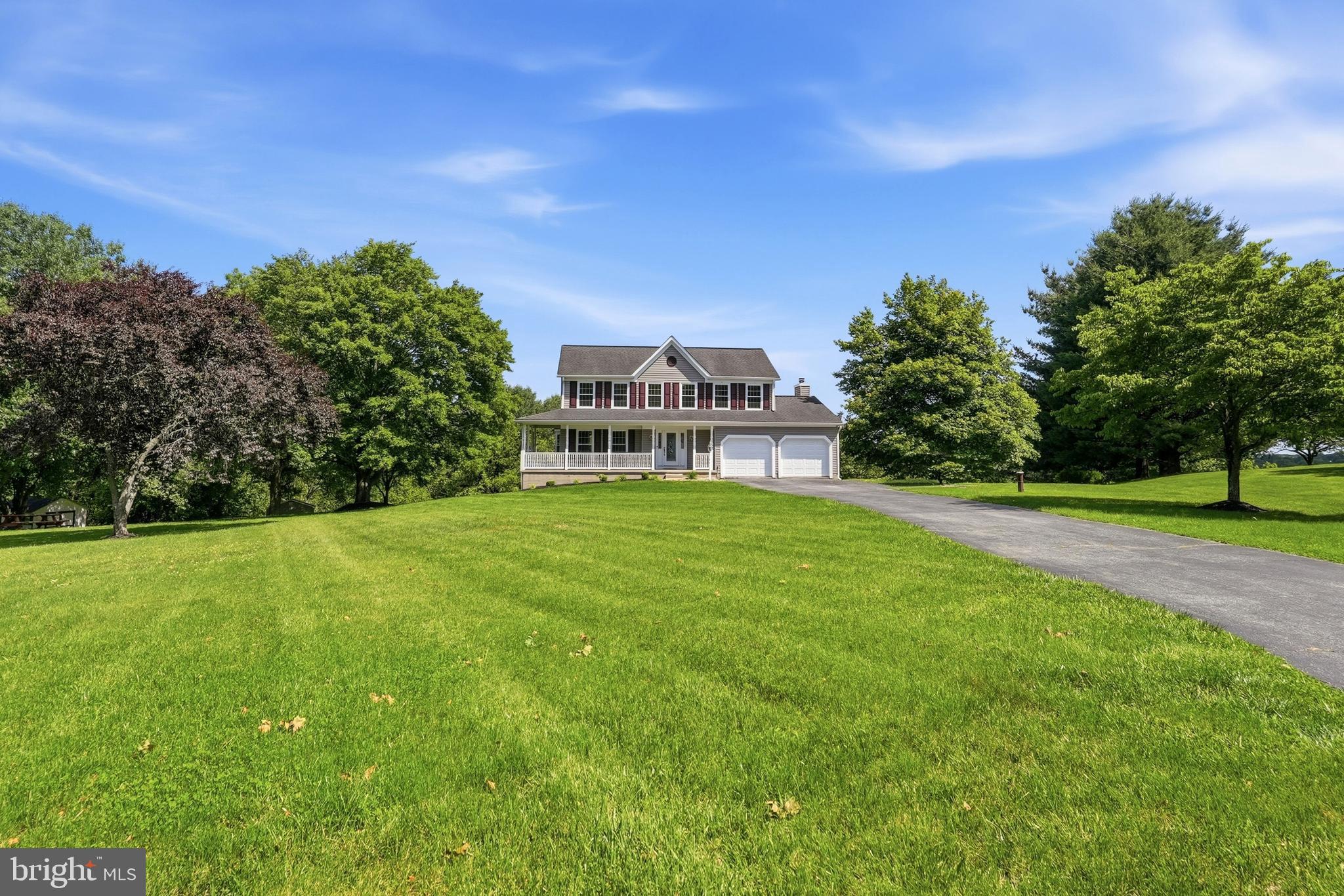 Welcome to 7 Zadoc Court, a beautifully maintained colonial tucked away on a peaceful cul-de-sac in the desirable Offutt Ridge community of Woodstock. Situated on a rare 1.33-acre lot, this home offers the perfect blend of privacy, usable outdoor space, and modern convenience.

Step inside to discover fresh paint throughout the main level, updated laminate flooring, recessed lighting, and a warm, inviting layout designed for both everyday living and entertaining. The spacious family room features a cozy fireplace, while the kitchen is equipped with stainless steel appliances and ample cabinet and countertop space.

Upstairs, the generously sized primary suite offers a walk-in closet and a private en-suite bath complete with dual vanities, a soaking tub, and separate shower. Two additional bedrooms and a full bath provide plenty of space for family, guests, or a home office.

One of the home's most exciting features is the unfinished walkout basement, offering approximately 860 square feet of additional space ready for your vision. Whether you dream of a recreation room, fitness area, home theater, guest suite, or additional bedroom, the possibilities are endless.

Outside, enjoy the serenity of your expansive lot surrounded by mature trees and scenic views. The two-car garage, extended driveway, and generous yard provide ample room for parking, outdoor activities, gardening, and entertaining.

Conveniently located near major commuter routes, shopping, dining, parks, and top local amenities, this move-in-ready home offers the peaceful setting you've been searching for without sacrificing convenience.

If you've been looking for a home that combines privacy, space, future expansion potential, and a sought-after Woodstock location, 7 Zadoc Court is a must-see.