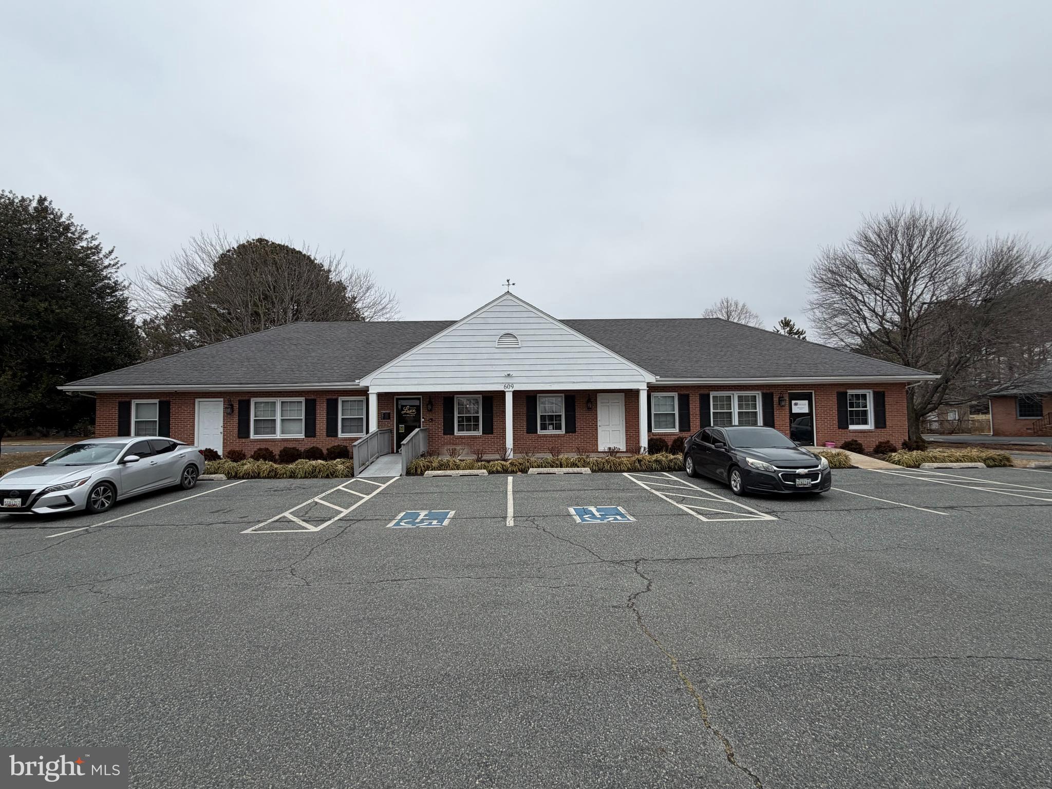 Discover the perfect addition to your portfolio with this high-visibility commercial building in Easton’s premier General Commercial (CG) district. Featuring a versatile multi-unit layout, this property is ideal for a mix of retail, professional offices, or service-based businesses. The site boasts an exceptionally rare asset for the area: an expansive, dedicated parking lot that ensures easy access for high-volume tenants and customers alike. With its strategic location, flexible floor plans, and proven potential for multiple income streams, this is a turnkey opportunity for the savvy investor looking to anchor their presence in a high-traffic corridor.