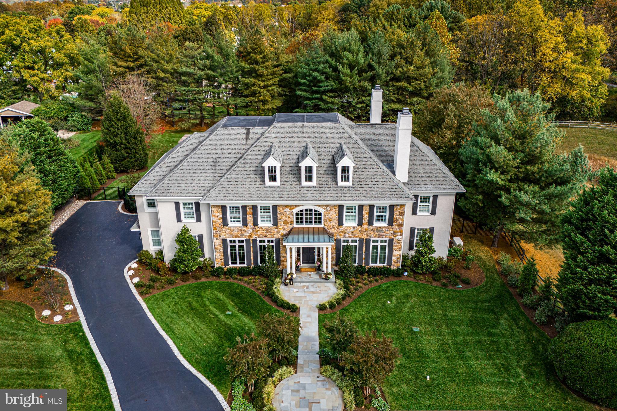 WOW! This sophisticated, modern masterpiece showcases spectacular spaces, designs, materials and every thoughtful amenity throughout. Every indoor and outdoor space has been completely and creatively reimagined and impeccably executed by the current owners and is ready for the next lucky buyers.  Located on one of the most private and quiet lots in the sought- after neighborhood of Whitegate, this one of a kind, sun-filled home  offers high ceilings with a wonderful open floor plan, all new designer fixtures, decor, spectacular gourmet kitchen, spa-like baths, an expansive primary suite with custom-designed closets and coffee bar, 4 additional spacious bedrooms with 3 additional full  baths on the second floor, renovated first floor mudroom with second laundry and dog shower, and an expansive finished walk-out lower level with full bathroom. Absolutely fabulous at every turn and close to renowned schools, shopping, restaurants, trains, clubs and endless recreational facilities. Low taxes. A rare opportunity!!