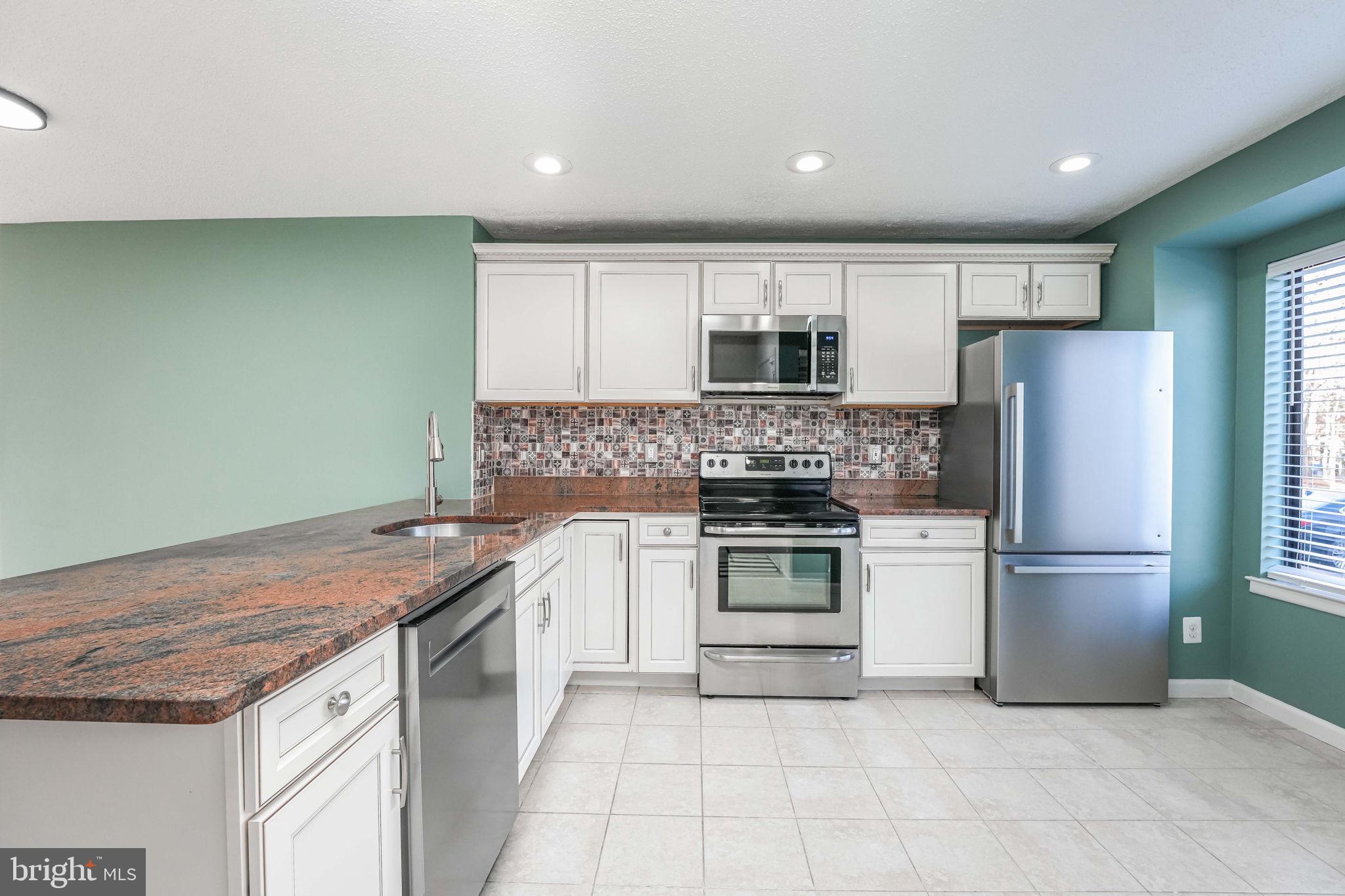 Open HOUSE December 17th, 2023 Sunday, from 1:00 PM – 4:00 PM. 
The deadline for all offers to be submitted by Wednesday, December 20th, 2023, at 9:00 PM. 

Renovations December 2023: New PAINT throughout interior, walls, Ceiling ceilings, trim, and doors. New Stain color for upper and lower parts of the Deck. New Refrigerator, New Microwave, New Dishwasher. HVAC Ducts cleaned, all Carpets professionally cleaned, Deep professionally cleaned throughout, and Recently Landscaped. All HOA-required repairs completed. Most home inspection items have been addressed and repaired as needed. 

Renovations February 2023” NEW primary and half bath vanities with mirror and lighting.

Charming 3-story Interior Townhome Residence, close to playgrounds, shopping, and neighborhood Waterview.  3 Bedrooms, 3.5 baths, combination Living/Dining and kitchen on Main Level. Large family room and utility room at basement level. 

On the Main Level: Spacious Open-Concept Living/Dining Area, Modern Kitchen with Upgraded Cabinets and Granite Countertops, NEW refrigerator, NEW dishwasher, New Microwave, Half Bath, and Deck Access from the Living Room. In the Basement: Cozy Family Room with a Wood-Burning Fireplace, 1 Full Bath, and a Convenient Utility Room with a Washer and Dryer.

Upper Level: You will find the Primary Bedroom with its primary bathroom, two additional bedrooms, and a hallway full bath. Exterior Features: Front Porch, upper deck on the back.  Recently Landscaped front and backyard. Interior Features: Carpet flooring throughout, Tile Bathrooms and Kitchen.  

Lake Ridge has an abundance of amenities with multiple swimming pools to choose from, clubhouses, tennis courts, and tot lots. This home is so convenient for shopping, schools, parks, and commuter routes.
Back on the market. Most home inspection items have been addressed; a report provided. Termite treatment was provided and all required repairs were completed. additional upgrades have been made as indicated above. 

Termite report, Home inspection report, and HOA DOCS. All or most items have been addressed and repaired as needed or indicated, all reports are available for review. 

Back on the market - Purchaser's choice. In lieu of Roof, all windows, and fireplace repairs, the seller shall offer up to 3% of the seller subsidy of the FINAL sales price.