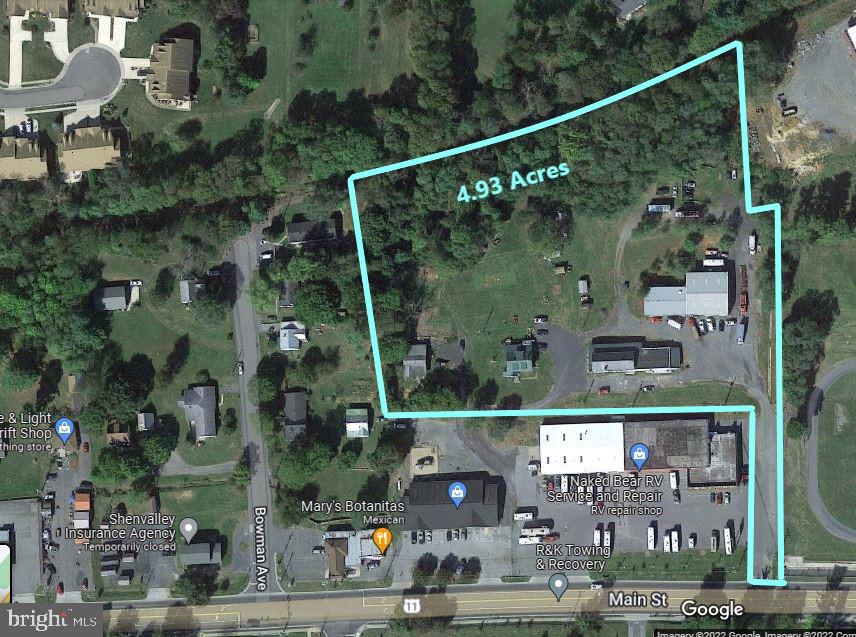 Woodstock corridor of growth, just south of Downtown, next to Massanutten Military Academy. The property in front of this 5 acre parcel was previously approved SUP for a mixed use project, containing 48 apartments over commercial, paving the way for additional development at this site. SUP has expired July 2023, needs renewed! Add to this central location the much touted "Rails to Trails" project that runs along the western border of this property if and when it is finally approved. The 5 acres is improved by two houses, one apartment building and metal commercial building leased to a body shop and towing company. The property is fully leased contributing a current income of over $106,000. Terrific income, while you rezone this property with a TND Overlay plan and phase in your Multi-Family redevelopment project at this site. Asking price is $1,550,000 at a 6.8% Cap Rate. Below market rents and the Multi-Family development potential at this site makes this a project you will want to take a closer look at. Imagine the possibilities!