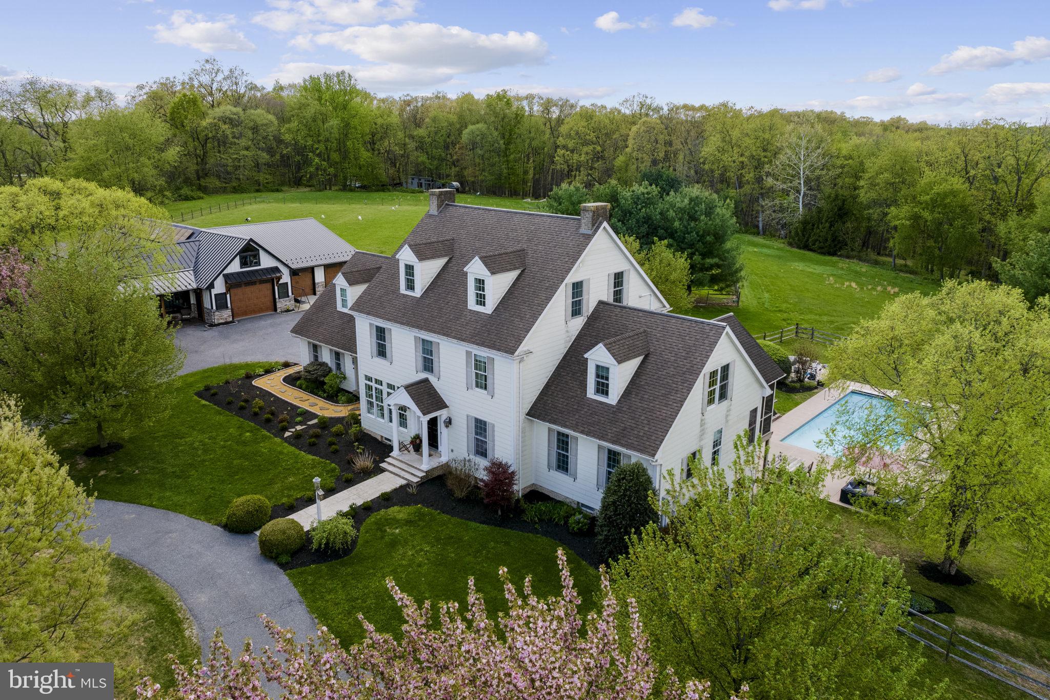 AUCTION PROPERTY.  AUCTION DATE- SATURDAY, June 27th @ 10 AM.   Listed price is opening bid price only and is not indicative of the final sale price. Property must go to auction. TERMS:  10% down day of auction, balance 60 days or before.  Buyer pays both transfer taxes (2% of sale price).  REAL ESTATE: #1 (Prop ID# 600-38535-0-0000) Rural one of a kind 28.8 ACRE farmette, custom & spacious 2½ story Colonial dwelling w/4506 SF finished area, large eat-in kitchen w/breakfast island & appliances, great room, family room, 1st floor master bedroom & bath, 5 bedrooms plus 2 bonus rooms, 5½  baths, 1st & 2nd floor laundry, 3rd floor 33x 16 bedroom suit w/kitchenette & bath, daylight basement, gas HW radiant heat, central AC, attached 2 car 24x30 garage & 20x40 in-ground pool. OUTBUILDINGS: Custom barn/garage/shop & office building 74x82 w/30x31 garage & 50x38 shop/garage w/radiant floor heat, 5 horse stalls, separate office 22x22 w/beam cathedral ceiling & gas fireplace & (2) utility buildings all on 28.8 ACRES w/15 acres cleared fenced pasture, balanced woodland.  Zoned Rural Estate Zone. REAL ESTATE #2 -PALA2088580- Country 3 ACRE lot ideal for custom home site. (Prop ID# 600-86617-0-0000)  Total taxes for lot are $2,097.   NOTE: Owners relocating to farm in York Co. & serious to sell.  This is a must see, move-in condition, spacious country house in a great location & desirable setting.  Warwick schools.  Minutes to Lititz, Ephrata, Brownstown, Oregon & Rt. 222.  OPEN HOUSE DATES: Saturday, June 6, 13 & 20 from 1 to 4PM.