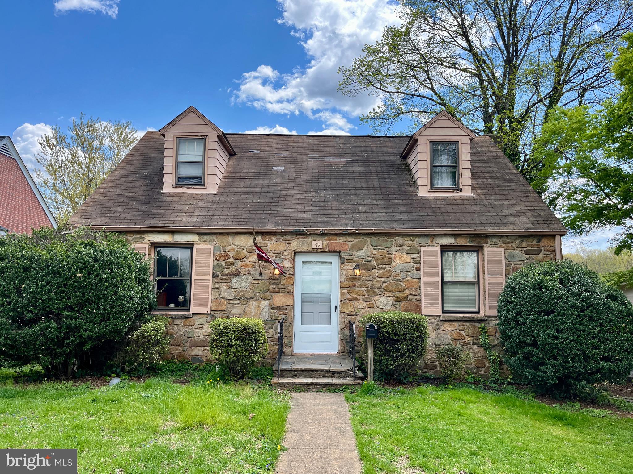 This 1949 single-family home in Warrenton offers a unique piece of history with its stonework salvaged from a fallen Civil War-era stone wall in Marshall, VA. The interior features original hardwood floors flowing from the living room to the dining area. Off of the dining room is the kitchen and laundry area, which opens to the fenced backyard. The main level includes two bedrooms and a bathroom, while an additional two bedrooms are located upstairs.

Please note, the property requires significant work. Updates needed include a new roof, water damage repairs, patching drywall, new kitchen appliances, and a bathroom remodel/repair. With some effort, this home has the potential to be a beautiful residence full of character. 

Located within walking distance to downtown Warrenton, you'll enjoy easy access to local shops, restaurants, and cafes. The downtown area offers a small-town feel with a mix of traditional and modern dining options, quaint boutiques, and a variety of services that help create a welcoming community atmosphere.