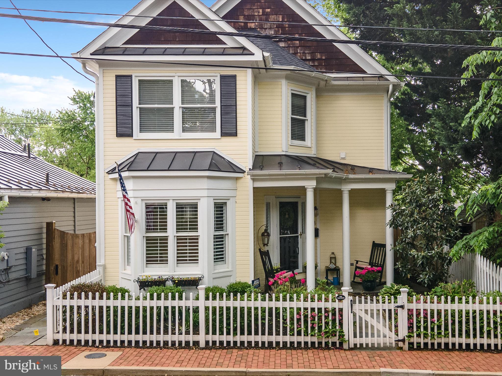 Crafted in 1995 by renowned local builder Paul Reimers – celebrated for his high-quality craftsmanship – this Victorian-style home boasts approximately 1,630 square feet of living space brimming with timeless charm and modern comfort. Set on a quiet side street in the heart of Historic Leesburg, it’s just a short stroll from downtown’s vibrant shops, restaurants, and the popular W&OD Trail for walking and biking. This location truly offers the best of both worlds – a friendly, walkable neighborhood and quick access to major commuter routes. You can enjoy an easy evening stroll to your favorite café and an easy drive to work the next morning. Step inside and you're greeted by gleaming newer hardwood floors that run throughout, leading you into a the dining room and bright, spacious living room warmed by a cozy gas fireplace – perfect for curling up on a cool evening or hosting movie night with friends. The modern kitchen has been beautifully updated with quartz countertops,  upgraded stainless steel appliances, new fixtures, a stainless steel farm house sink , complemented by a walk in  pantry  loads of cabinet space. It offers both style and functionality, whether you’re whipping up a quick week night dinner or preparing a holiday feast. Upstairs, you will find a convenient laundry  space, the large primary bedroom boasting a walk in closet and private renovated bathroom and two additional bedrooms that share a Jack and Jill fully renovated bathroom. There is also a  convenient half bath on the main level for your guests. Outside, the home is just as enchanting, starting with a storybook front porch that’s perfect for sipping your morning coffee and greeting  neighbors as they stroll by. Out back, a private custom patio bordered lush landscaping and a fence that  offers a tranquil spot to unwind or entertain. . Even with its in-town location, this property doesn’t skimp on practical features – a large attic and backyard shed provide ample storage for everything from sports gear to holiday decorations. With its blend of historic charm, modern comfort, and a prime downtown location, this home encapsulates the very best of Leesburg living. Don’t miss the chance to make 18 Ayr St SW your own and experience life in the heart of Historic Leesburg!  Updates include: new roof and gutters in 2020, plantation shutters on most windows and custom shades installed in 2021. Water heater Fall 2020, custom paint throughout home 2021, Updated all bathrooms with quartz counter tops and custom fixtures 2021, all new high efficiency commodes (2021),  new dryer in 2020 and washer 2025