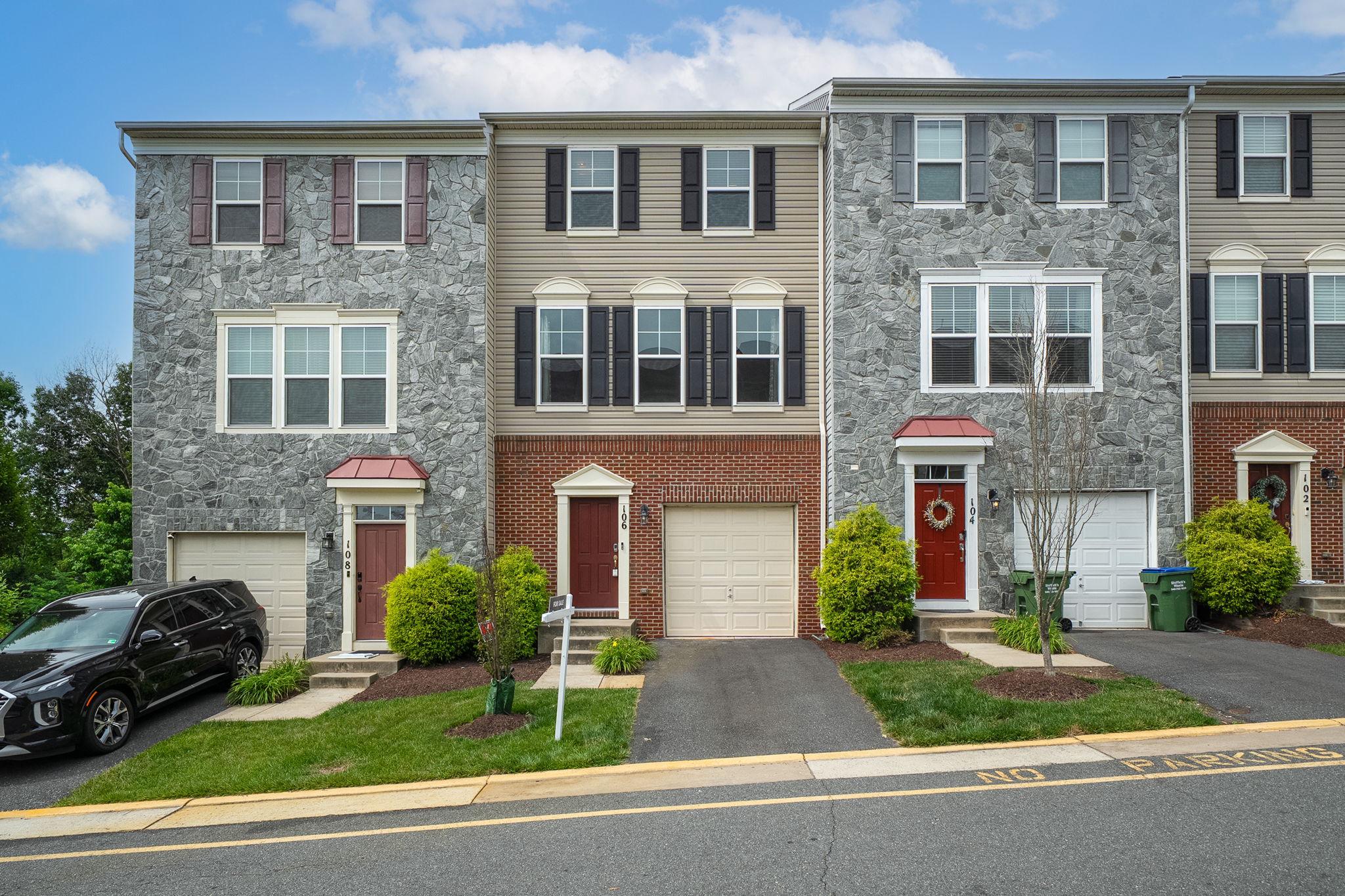 Welcome home to this beautifully maintained 3-bedroom, 2 full and 2 half bath townhome in the highly desirable Village at Woodstream community! Built in 2016 and freshly painted in 2026, this move-in ready home offers the perfect combination of modern finishes, functional living space, and an unbeatable Stafford location.

Step inside to an open and inviting floor plan featuring hardwood floors, abundant natural light, and spacious living and dining areas designed for both everyday living and entertaining. The gourmet kitchen is the heart of the home, complete with stainless steel appliances, a large center island, pantry, breakfast area, and ample cabinet and counter space. Custom window treatments in the living room add a touch of elegance and style.

Upstairs, the spacious primary suite serves as a private retreat with a walk-in closet and a luxurious en-suite bath featuring a dual vanity, soaking tub, and separate walk-in shower. Two additional bedrooms provide flexibility for family, guests, or a home office. The finished lower level offers additional living space perfect for a recreation room, gym, or media area.

Enjoy outdoor living on the rear deck overlooking the backyard, providing plenty of room to relax, grill, and entertain. The attached garage and driveway offer convenient parking and additional storage.

Residents of Village at Woodstream enjoy outstanding community amenities including a clubhouse, fitness center, swimming pool, playgrounds, walking trails, and lawn maintenance included through the HOA.

Ideally located just minutes from I-95, Route 1, Route 610 (Garrisonville Road), commuter lots, and the Brooke and Quantico VRE stations, this home offers an easy commute to Quantico, Fredericksburg, Northern Virginia, and Washington, DC. You'll also love being close to shopping, dining, parks, schools, and everyday conveniences.

Don't miss this opportunity to own a beautifully updated and meticulously cared-for home in one of Stafford's most convenient and sought-after communities!