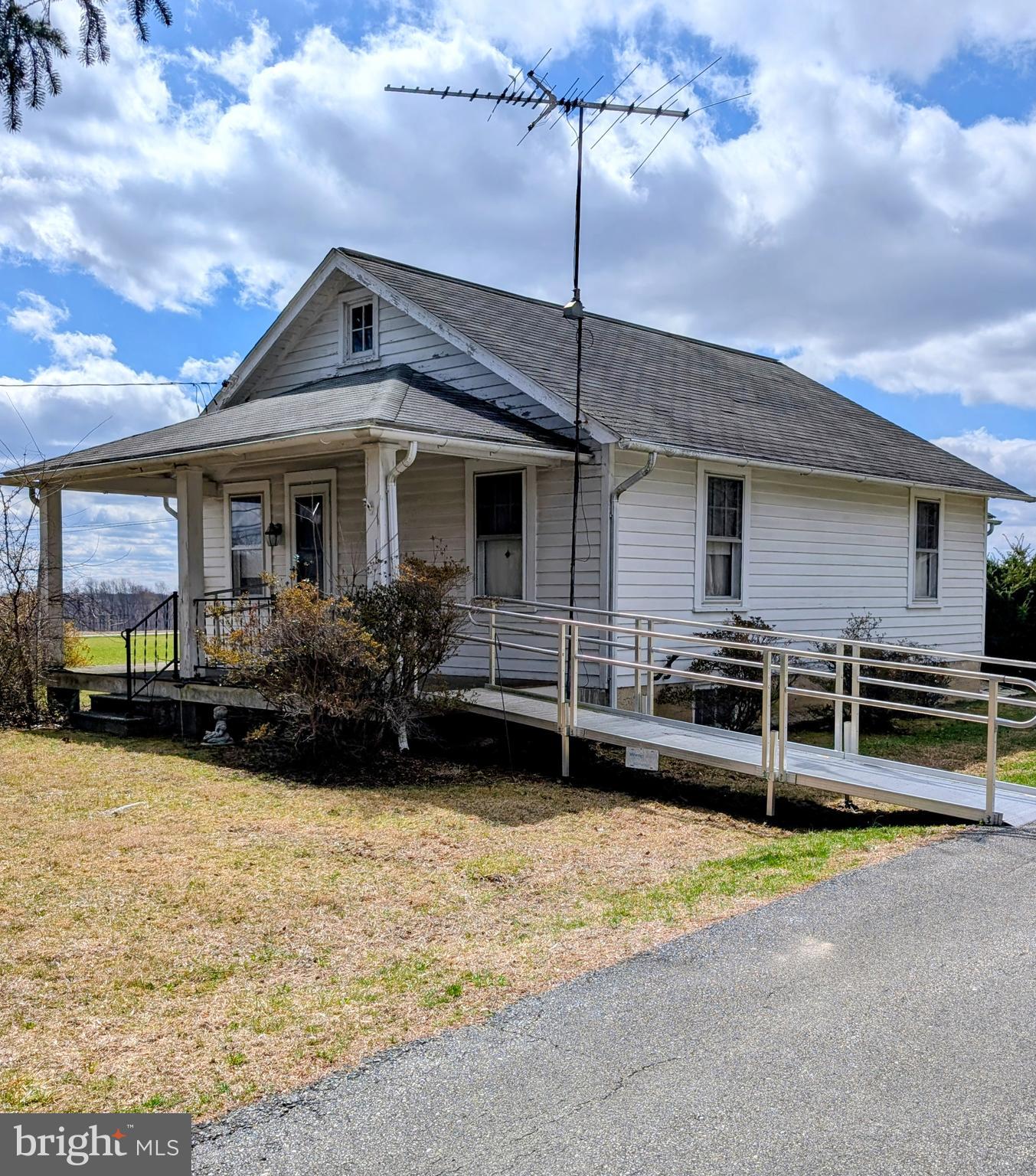 This  property is being offered a live on site Public Auction on Wednesday, June 3, 2026 at 1pm.  This listed price is not the sale price and property may sell for higher or lower than this list priced at public auction subject to seller confirmation of price.  Auction Terms:  10% down payment day of auction, balance of purchase price by July 17, 2026, Buyer pays all realty transfer taxes, property taxes prorated at settlement, property sold in "as is" condition.  The property consists of a one story dwelling on a 2.2 acre partially wooded lot with 3 bedrooms and one full bath on the main floor.  There is a large living room with a stone fireplace and an eat in kitchen also on the main floor.  There is floored attic storage with stairway access and a basement with an outside entrance.  There is a covered front porch and rear deck. There are handicap ramps at the front and rear entrances.  There is a detached 14'x23' garage with a small storage addition to the rear.  Great location with easy access to shopping and major routes.   Adjacent 4..4 acre +/- lot also being offered separately at auction at the same time. This is an estate auction and it is seriously for sale-Don't miss it!!