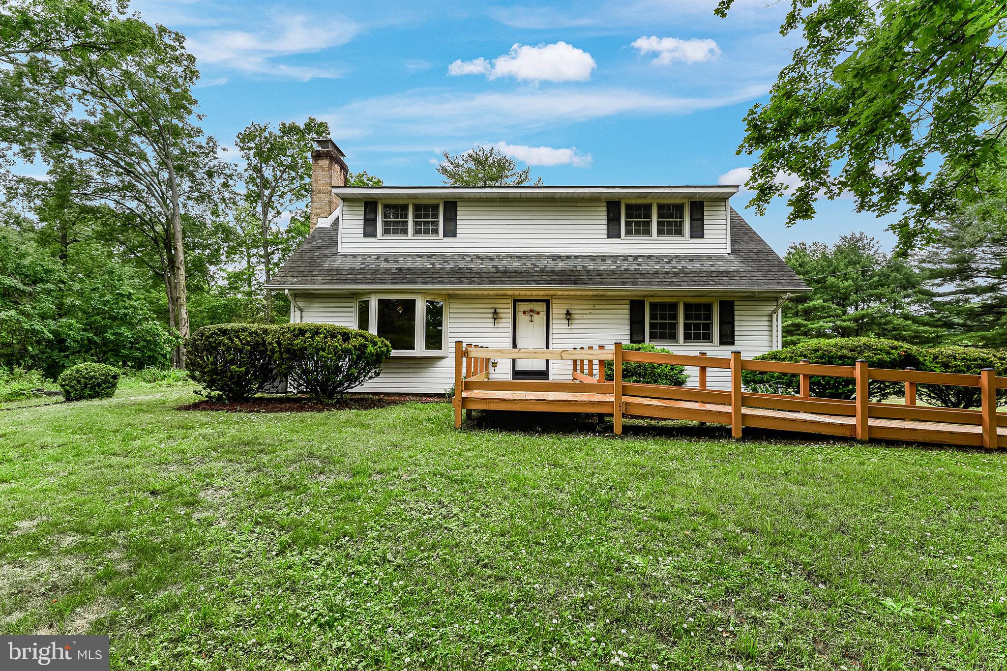 Wonderful almost an acre setting with charming interior and flow to this home. Hardwood floors, 2 large bedrooms on the first floor plus living room with fireplace, dining room and bright kitchen with 42 " cabinets and full bath. The full basement. The upper level has 3 bedrooms and full bath.