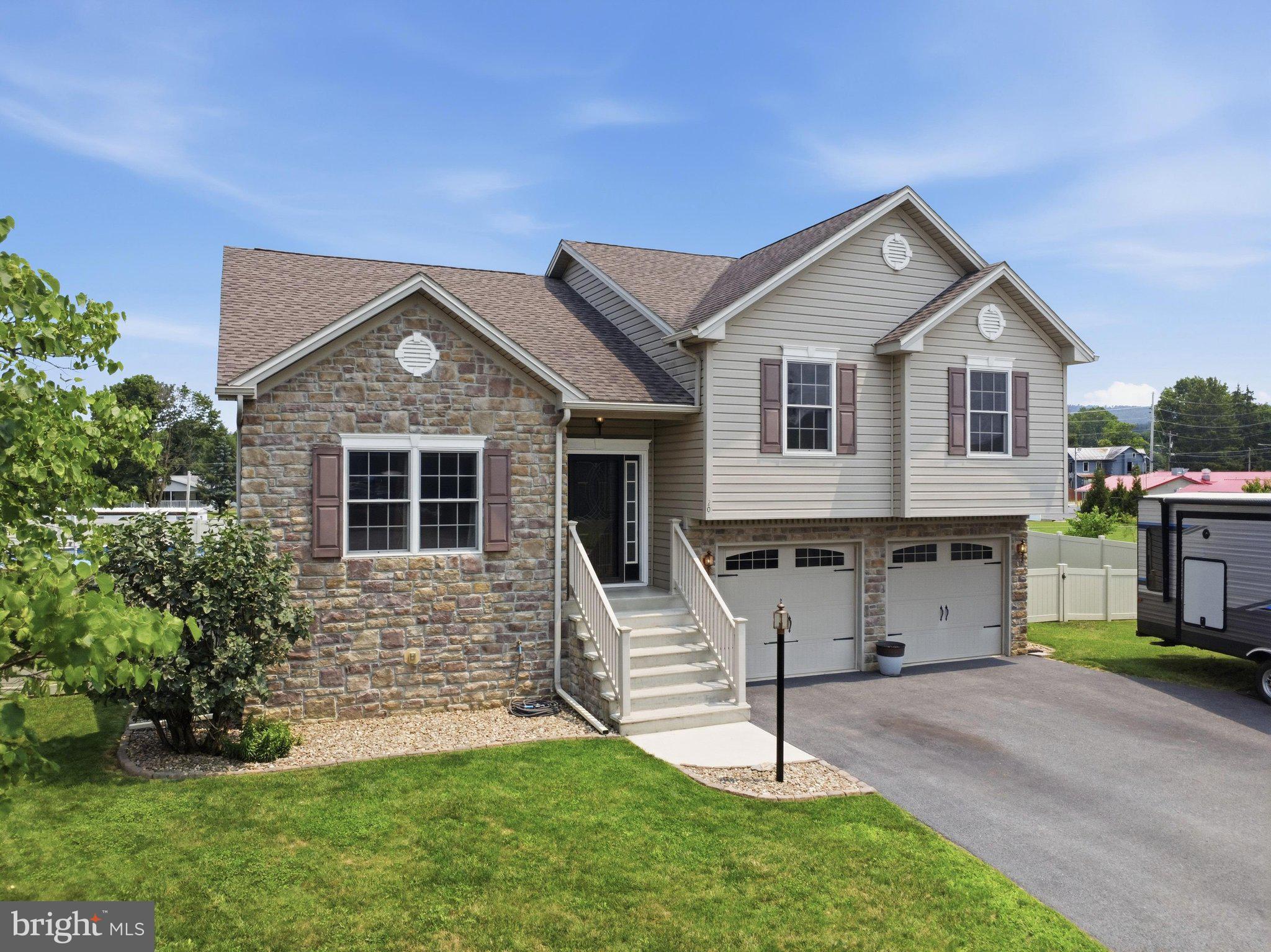 Pool? Check! Hot tub? Check! Huge Yard? Check! Welcome home to this stunning split foyer nestled in the desirable Rine Estates! This well-maintained home offers 3 bedrooms and 2.5 bathrooms, including a spacious primary suite with vaulted ceilings that enhance the already generous space, along with a walk-in closet, jetted soaking tub, and separate walk-in shower. The inviting sunken living room provides the perfect place to relax, while the beautiful kitchen boasts a large center island, abundant cabinetry, and an adjoining dining area ideal for everyday living and entertaining.

The lower level offers a cozy family room with a convenient half bath and walk-out access to your own backyard oasis. Spend your summers enjoying the pool, unwind in the hot tub after a long day, or host in the fully fenced outdoor space designed for entertaining.

But there's even more than meets the eye! Don't let the fencing fool you—this property sits on an oversized lot that's a rare find in a neighborhood setting. Be sure to check out the property map! Whether you're tossing a football, kicking a soccer ball, setting up a volleyball net, playing a game of catch, or simply enjoying room to roam, you'll appreciate the extra outdoor space that sets this home apart. Conveniently located just minutes from shopping, dining, schools, and I-81, this home offers the perfect combination of comfortable indoor living and exceptional outdoor amenities. Don't miss your opportunity to make it yours! This one CHECKS all the boxes!!