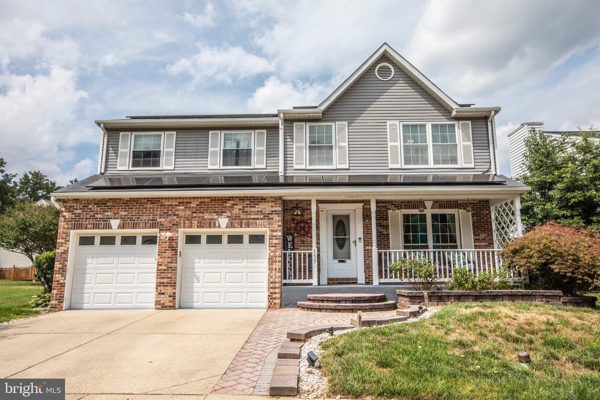 ***Owned Solar Panels, EV charger, minutes from Fort Meade, Odenton MARC train station and NSA. These are just the start of what this home has to offer. This exquisite colonial home offers exceptional space and thoughtful updates across three beautifully finished levels. 
The main level features generous natural light and hardwood floors throughout. The layout includes a family room, dining room, kitchen, wet bar and living room ideal for daily living and entertaining. The kitchen features updated stainless steel appliances, ample cabinet storage, a large pantry and an island with a breakfast bar.
Upstairs, you'll find four bedrooms, including an impressive primary suite featuring an updated bathroom offering stylish finishes, a freestanding soaking tub and a spacious walk-in closet. The additional bedrooms are equally inviting and share a full updated bathroom. 
 
The finished lower level is equipped with two bedrooms, a laundry room with updated washer and dryer, a fully updated bathroom and additional flex space.

Additional highlights include crown molding, chair railing, a charming covered front porch, large deck, cozy fire pit, and storage shed. For added energy efficiency the attic was reinstalled (2025).

Located in the highly desirable Seven Oaks community, you'll have access to amenities including outdoor pools, clubhouses, fitness centers, playgrounds and fitness trails. There are also tennis, pickleball and a basketball courts.