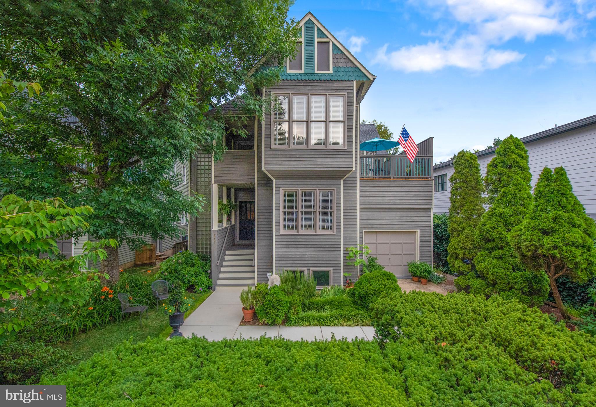 A San Francisco Victorian in the heart of Eastport, the maritime district of Maryland’s state capitol of Annapolis. The owners have created an inviting oasis beginning at the front walk, moving throughout the home and out to the rear gardens that were designed to be lived in and enjoyed.   There are exquisite details and high-end finishes at every turn – custom mouldings, arches, pocket doors, hardwood and travertine floors.  At the center of it all is a chef’s dream kitchen thoughtfully crafted around a 5 x 6 Verona Rosa marble island, Wolf gas cooktop and double wall ovens, Sub-Zero refrigerator/freezer, bar refrigerator and wine cooler.  Upstairs the owner’s suite is the perfect retreat of bedroom, dressing room, spa bath and private deck.  Two guest bedrooms with shared bath and deck off the gallery hall complete the upper level.  There is an unfinished lower level with a walkout to the garden awaiting your finishing touches. The home is sophisticated, warm and welcoming to family and friends – an entertaining delight! Eastport, located across Spa Creek from City Dock and the U.S. Naval Academy ...all within steps of marinas, restaurants, and shops.