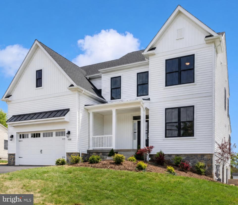 New construction. Walkable lifestyle. Luxury finishes. This is Sykesville living at its finest!! 

Welcome to Sykesville's most exciting NEW addresses- MOVE IN READY — a stunning NEW CONSTRUCTION modern farmhouse where timeless character meets luxury craftsmanship, all just a short stroll from the charm of historic downtown. Walk to award-winning restaurants, quaint boutiques, and beloved community festivals from your own front door.

Spanning nearly 4,000 square feet on a flat, open homesite, this thoughtfully designed 6-bedroom, 5-full-bath residence offers the space and flexibility today's buyers crave. The main level features a dedicated bedroom and full bath — ideal for guests or multigenerational living — alongside an open-concept layout bathed in natural light. The chef's kitchen is a true showpiece, appointed with quartz countertops, a professional gas range, and a double oven built for entertaining at every scale.

Upstairs, four generously sized bedrooms and three full baths provide the comfort and privacy every member of the household deserves. The finished lower level adds incredible versatility — a sixth bedroom, full bath, and expansive living space perfect for a home theater, gym, or recreation room.

Outside, the flat and open homesite offers a rare blank canvas to create your dream outdoor retreat. Brand new construction means modern energy efficiency, the latest building standards, and the peace of mind that comes with everything being yours from day one.