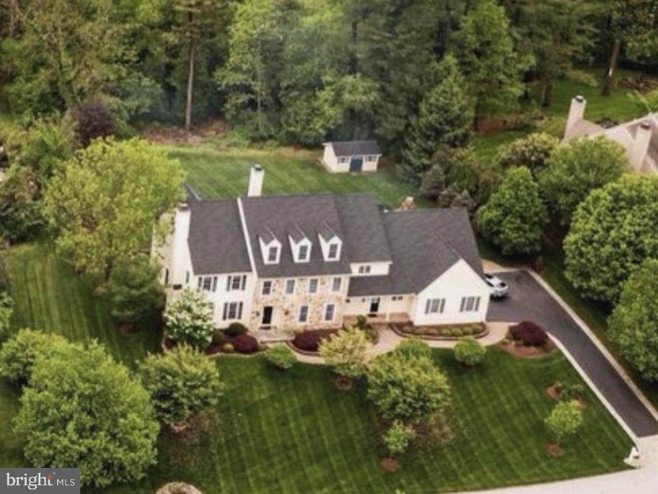 Nestled at the end of a quiet cul-de-sac in beautiful Pocopson Township, this exceptional 6-bedroom, 5 full and 2 half bath home offers the perfect combination of luxury, comfort, and convenience within the award-winning Unionville-Chadds Ford School District. Situated on a picturesque 1-acre lot, this impressive residence features a grand two-story foyer, site-finished hardwood floors, a formal living room with a gas fireplace, and a spacious family room with a cozy wood-burning fireplace. The gourmet kitchen is truly the heart of the home, offering generous workspace, abundant storage, and an ideal layout for everyday living and entertaining. The luxurious primary suite provides a private retreat with spacious walk-in closets and a spa-inspired bath, while the additional bedrooms and baths offer exceptional flexibility for family and guests. A finished lower level includes space for a home gym, recreation area, playroom, and extensive storage. Outdoor living is equally impressive, featuring a newly added natural stone fireplace, fire pit, custom walkway, and beautifully landscaped grounds designed for relaxation and entertaining. An oversized 3-car garage and abundant storage throughout the home add to its practicality. Enjoy the charm of Pocopson Township with nearby apple orchards, local mushroom farms, scenic countryside, and the beloved Northbrook Market, where residents gather for freshly prepared foods, homemade donuts, local honey, ice cream, fresh milk, and casual family dining. Offering low West Chester taxes, breathtaking surroundings, and one of the region’s most sought-after school districts, this remarkable property is more than a home; it’s a lifestyle.
