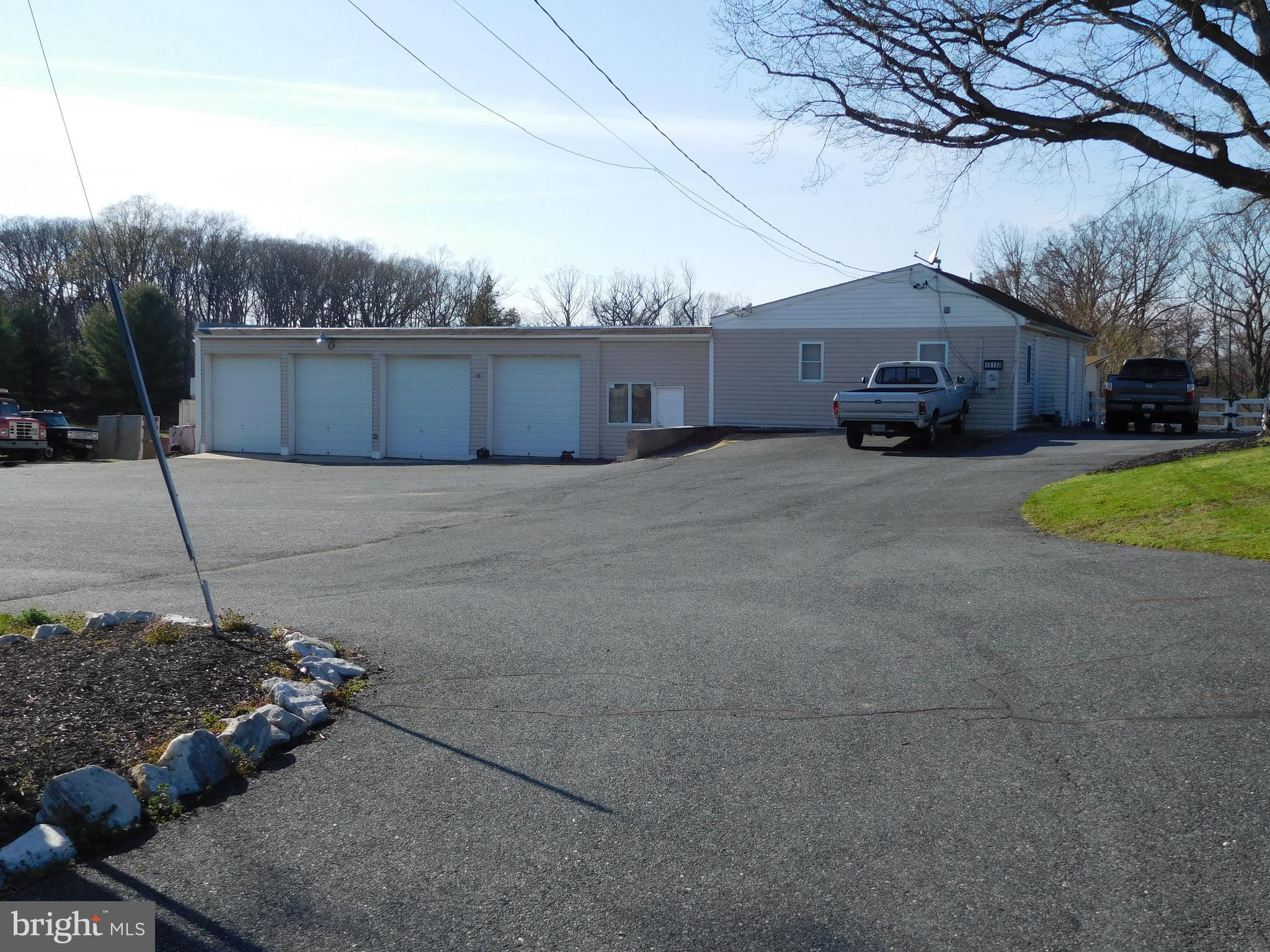$1,000 Bonus for Contract by 11/29. Shop with Yard (10130) , BM  Zoned with Brick Rancher (10132)  on large split zoned  parcel , 4.3 acres . Opportunity   for business/ home combo  or dwelling rental.  Home has new kitchen,  2  Frpl. 2 bdrm .2 bath .1 garage, pool.  Also available  is 10126  Bird River , dwelling on  BM parcel.  Buyer to verify use.  Shop rented with equipment excluded