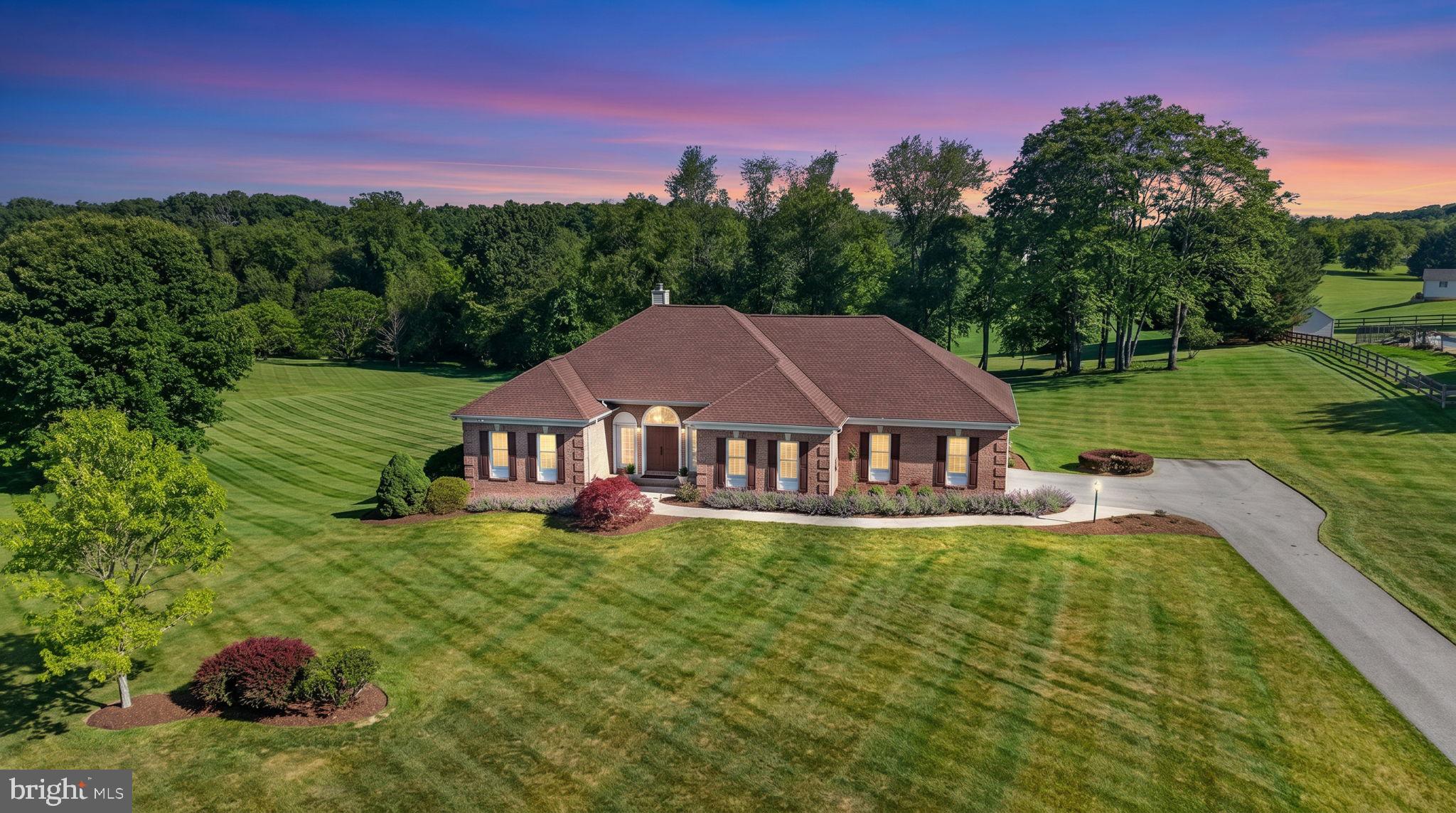 Welcome to 710 Waters Edge Court! First time this home is available from the original owners.  This custom rancher features 4 bedrooms, 2 full baths, and 1 half bath, including a convenient primary suite with its own private bath. The partially finished lower level adds versatility with a half bath, dedicated workshop, temperature controlled wine cellar, and open areas ideal for future rooms, hobbies,  and plenty of storage. A blank slate to customize for your needs! 

The lot provides 3 acres of flat useable yard space to customize with swimming pool, pickleball court or detached garage. The possibilities are endless! The owners have truly cared for the home inside and out with regular lawn treatments which shows as the yard is meticulously kept with beautiful plush green grass. You'll feel like you're in a park setting with the gazebo in the backyard to watch the gorgeous sunsets. The deck is partially covered with a ceiling fan to enjoy the summer nights and direct access from the main level.

Recent major improvements include a new roof in 2018, new HVAC system installed in 2025, well pump replaced 2024 and updated kitchen appliances, counters and backsplash. The attached 2‑car garage is designed for function, offering tool storage and a handicap‑accessible ramp for ease of entry. With its single‑level layout, including washer/dryer on main level  flexible lower level, this home offers comfort, convenience, and plenty of room to grow.

Situated within the established Waters Edge community with direct walking access to Piney Run Lake. Residents enjoy a peaceful neighborhood setting with mature trees and easy access to nearby parks, shopping, dining, and commuter routes throughout Carroll County and just 15 minutes to the Howard County line!