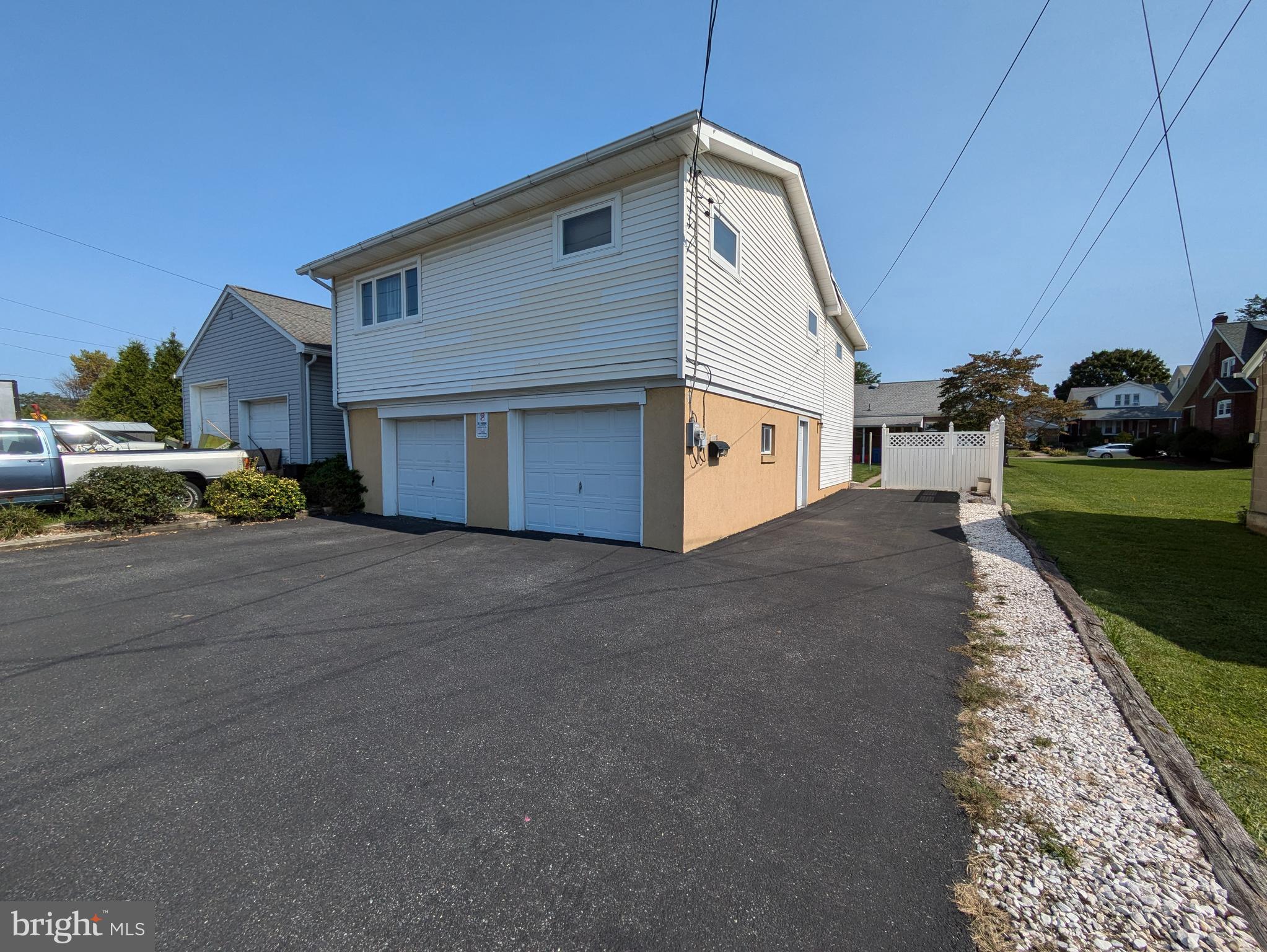 Over 1100 square feet of living space plus a 23x25 2 car garage. 2 bedrooms, large living and family rooms. Eat in kitchen plus a formal dining room. Updated bathroom, insulated attic, central air and oil baseboard heat and hot water. In addition to the garage there is 4+ parking spots. There is a washer and dryer, refrigerator for the tenant to use. This one won't last long with the large garage space.
