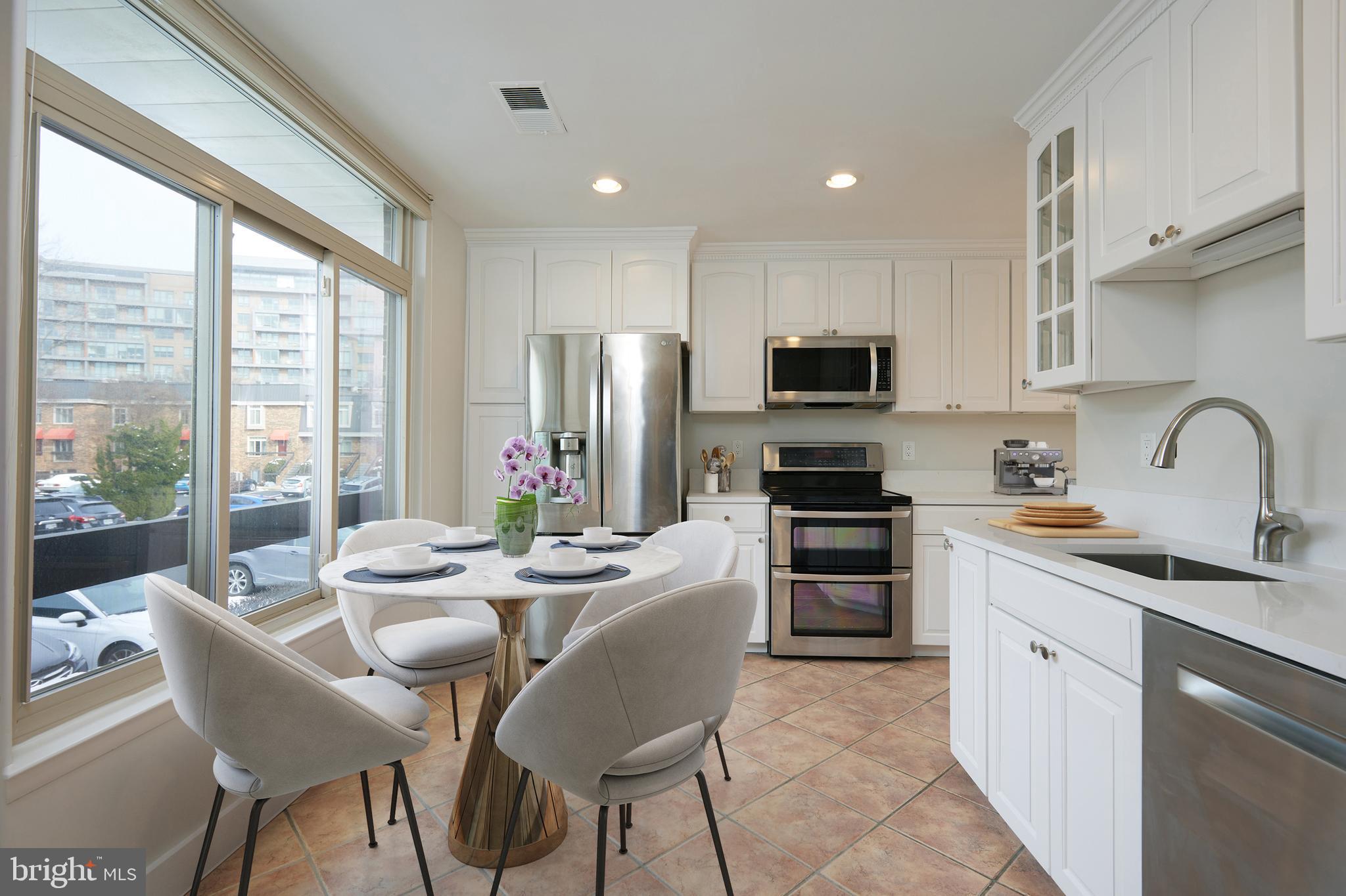 Open Houses Saturday and Sunday, January 27th and 28th, from 1-4 pm!

Big, Bright, and Beautiful Upper-Level End Unit in the Southampton Condominium adjacent to Pentagon City, Amazon's HQ2, and all that National Landing offers.

This lovely townhouse has three good-sized bedrooms, two and a half updated bathrooms, and a clean, crisp, bright white eat-in kitchen with new quartz countertops and stainless steel appliances. It is a cook's dream, with tons of storage and counter space. A large welcoming foyer on the main level leads to an open-concept living room and dining area, providing the perfect flow for entertaining friends and family. Additional Main Level conveniences include a laundry closet with a side-by-side washer/dryer, ample storage under the stairs, gleaming wood floors and recessed lighting, a wood-burning fireplace, and a private balcony overlooking the common area. The upper level includes a spacious primary bedroom with room for a king-size bed, three closets, and a renovated ensuite bath with frameless glass. There are two additional well-proportioned bedrooms and a renovated hall bath. This level features plantation shutters in all three bedrooms and wood floors in the bedrooms and hallway. This unit also comes with an assigned parking space.

The Southampton Condominium is just blocks from Pentagon City and the Pentagon City Metro. Whole Foods, Harris Teeter, Target, Costco, Starbucks, Commonwealth Joe, and dozens of other shops and restaurants are within blocks. The location is also near Virginia Highlands Park, new shared spaces, and play spaces around the new Amazon HQ2 buildings, and it is only one metro stop from DC or National Airport. This condo has everything you need for a comfortable home amid one of the DMV's most desirable and vibrant live/work environments.