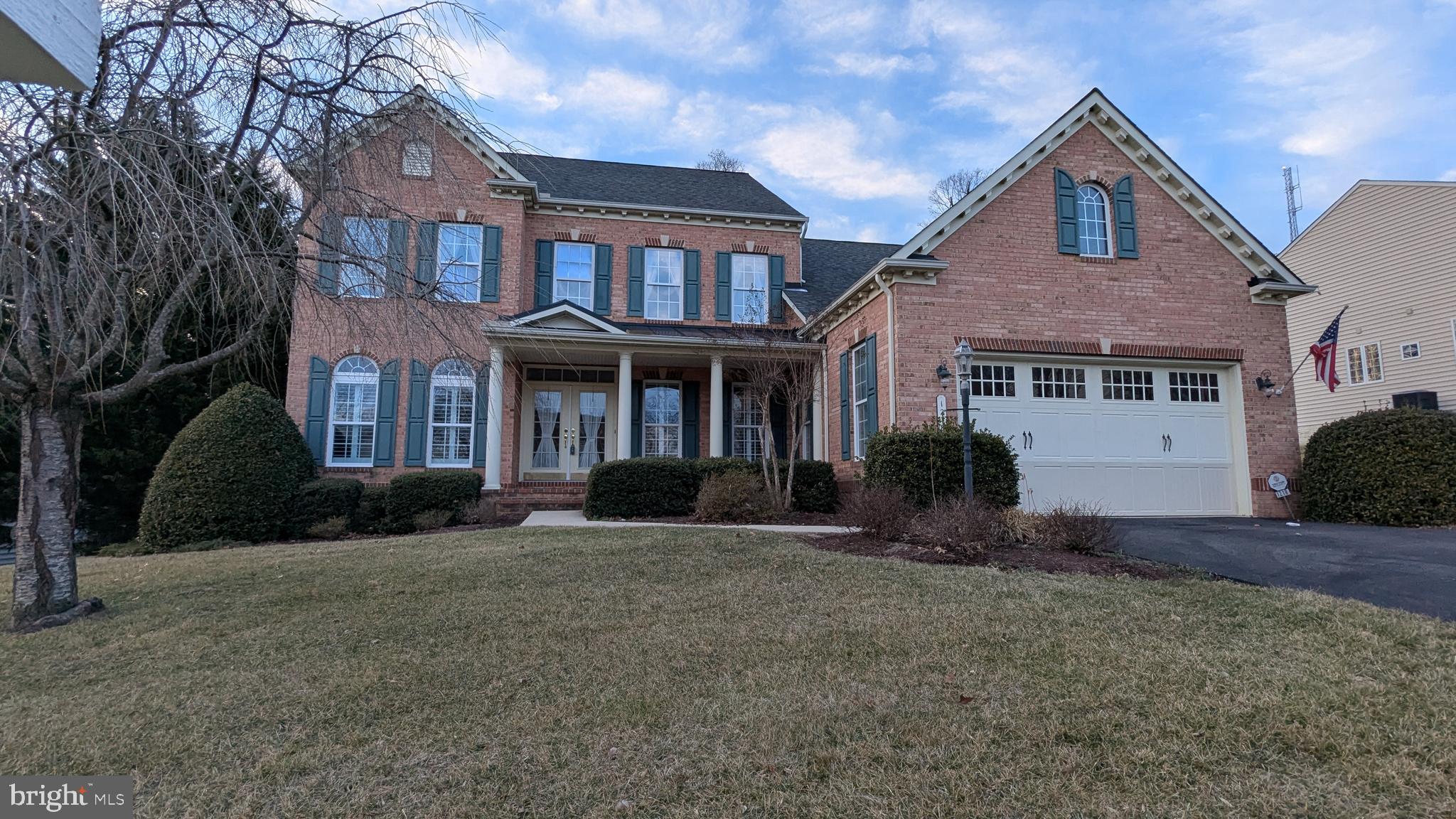 ***OPEN HOUSE This weekend, Saturday and Sunday, March 15 & 16, 11am - 1pm.***
Welcome to this stunning colonial-style home in the tranquil 55+ community of Stonecrest. As the largest model in the neighborhood, this residence features a grand double-door entrance, covered front porch, and elegant interiors with plantation shutters, crown molding, high ceilings, and hardwood flooring. The 2-story family room with a fireplace serves as a striking centerpiece. The kitchen is a chef’s delight, boasting a large island, breakfast bar, and ample space for casual dining and meal preparation. A bright morning room bump-out fills the space with natural light and opens to the deck, perfect for outdoor relaxation or entertaining. The main-level master suite offers a jetted tub, separate shower, and walk-in closet. Upstairs, three additional bedrooms and a full bath provide plenty of space for guests. The expansive lower level features a massive finished living area with endless customization possibilities. There’s also a bath rough-in and additional unfinished space that could be transformed into a recreation room, home office, or even a 5th bedroom. Additional highlights include zoned HVAC for year-round comfort, an irrigation system to keep the lawn pristine, and HOA-maintained yard care for hassle-free living. Move-in ready, this home is a must-see in the desirable Stonecrest community.
