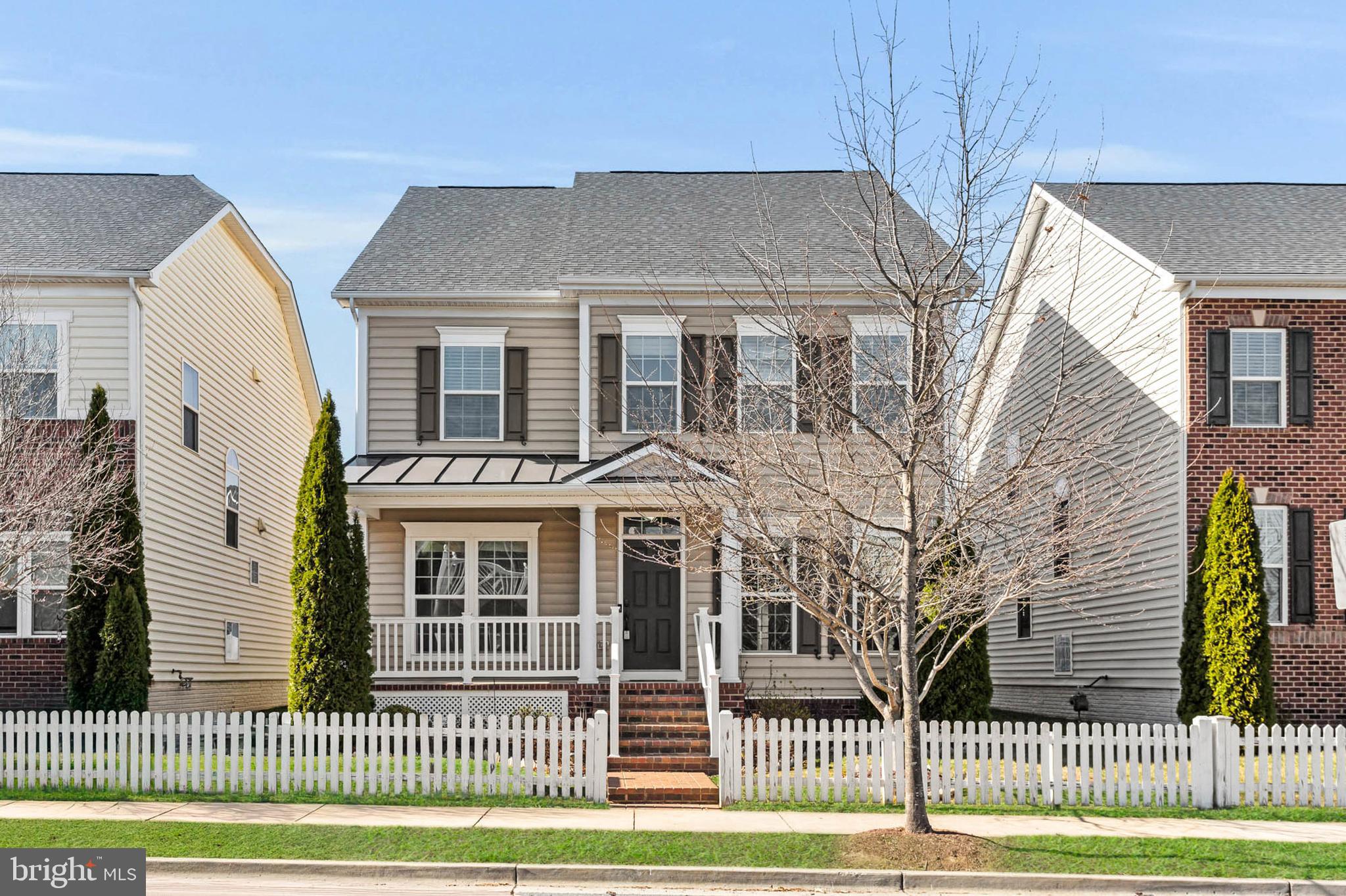 Spectacular, meticulously maintained 3 Level Colonial home with newly installed carpet and fresh paint throughout, 5 bedrooms, 3.5 bathrooms and 3,600 Sq Ft of pure sophistication, located in the sidewalk friendly neighborhood of Clarksburg Village. MOVE IN READY, abundant with Builder Updrades and Community Amenities GALORE! A charming, welcoming covered porch will greet you when you arrive home. Cross the threshold to find graceful archways and gleaming perfect hardwood floors flowing throughout the spacious, bright and open Main-Level. The Main -Level is highlighted by 9ft ceilings, formal Dining Room, Living Room, and Family Room off of the Kitchen. The Gourmet Kitchen is a chef's dream! Rich cherry cabinetry, Granite countertops with coordinating backsplash, Stainless Steel Appliances, Butler's Pantry. 4 burner gas cooking, large Breakfast Bar with seating for 4 and a Breakfast Room with access to the rear17x17 Trex Deck. The Upper Level sleeping quarters are all very generously sized and feature 9 Ft ceilings. The Primary Suite has an intricate tray ceiling, enormous 12x6 walk-in closet and Luxury En-suite bathroom with a granite topped dual vanity, soaking tub and separate stall shower with 2 shower heads. Additionally on this level you will find 3 more bedrooms, hallway full bathroom and Laundry Room. The sprawling Lower-Level is fully finished to include a Media Room, Den, 5th bedroom, full bathroom and storage room. Outdoors enjoy the tranquility while you relax on the 17x17 Trex Deck with privacy walls. You may also access the 2 car detached garage from the deck. There are lovely views of the manicured lawn and landscape that includes mature trees and shrubs. Enjoy resort style living with the Community Amenities that include a clubhouse, swimming pool, tot lots, fitness center, walking trails, soccer field, dog park, activities for kids and adults and so much more! Conveniently located near Shopping Centers, Restaurants, Outlets, Clarksburg Metro , Shady Grove Metro and Marc Train. Easy access to Rts 27, 270 and 355. This home and location fits most anyone's needs. Don't miss out on the amazing opportunity to own this stunner in a friendly neighborhood...schedule your showing today!