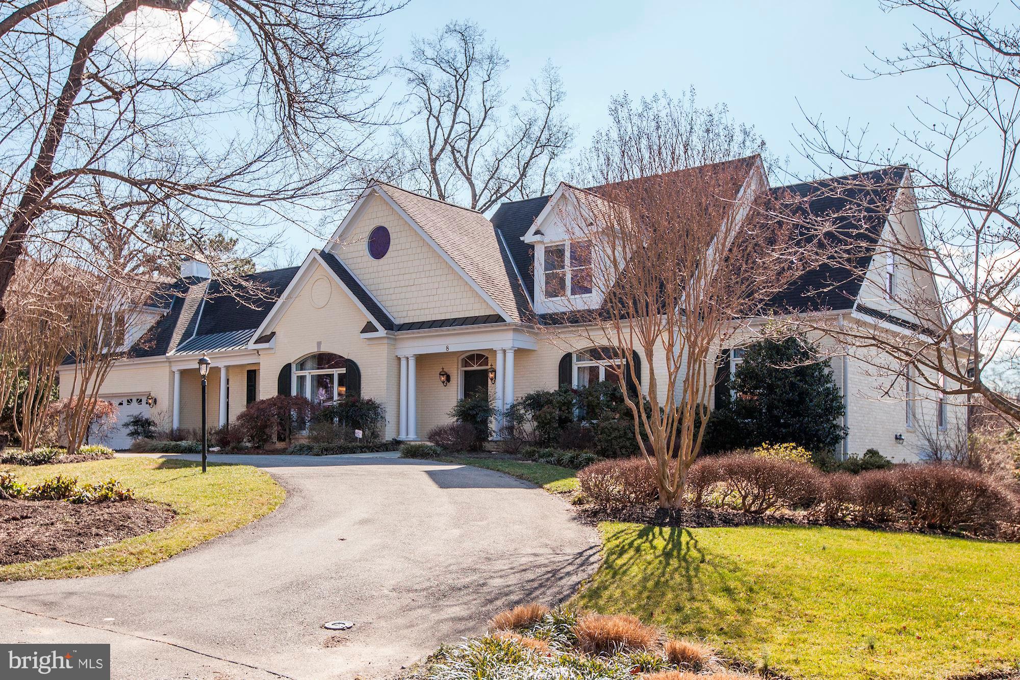 DO NOT MISS THIS ONE! Fabulous, bright corner Cape Cod (full new build in 2001) and further improved since 2016. MAIN LEVEL MASTER SUITE with sitting room and den/library/office. Add'l master suite with sitting room plus 3 BRs and hall bath upstairs. Lower level is finished, adjacent workshop and cellar for storage. Ample storage everywhere in the home. Huge gorgeous windows throughout, spacious hallways, gracious flow, hardwood floors, luxe chef's kitchen with designer appliances, double ovens, double dishwashers, 3 sinks, and more. Rear deck to wonderful yard with mature plantings, including crepe myrtles- side and front yards, too. 3-car garage with parking and more on driveway. 1/2 acre corner lot.  1 mi to White Flint Metro or Pike and Rose. Close to Luxmanor Park, too!