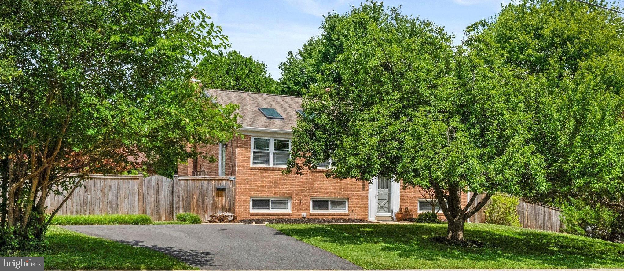 Nestled in McLean, this well maintained split foyer home offers a versatile layout, numerous updates, and exceptional indoor and outdoor living spaces. The upper level features a bright and functional floor plan with two bedrooms and a full bathroom. The renovated kitchen serves as the heart of the home, offering updated finishes and appliances, including a refrigerator and dishwasher replaced in 2025. The upstairs bathroom was renovated in 2019, adding to the home's move in ready appeal. The lower level provides an impressive amount of additional living space with three bedrooms and two full bathrooms. Renovations completed in 2013 and 2014 enhanced the functionality of the lower level, including the addition of a full bathroom and updates to the laundry room, creating flexible living options for guests, home offices, or multi generational living. Step outside to enjoy your private backyard retreat. The spacious deck, added in 2016, overlooks a beautifully maintained yard complete with a fenced perimeter installed in 2023, a storage shed, and an inviting swimming pool. Significant pool improvements completed in 2024 include a new filter, motor, tile, and coping stone, creating the perfect setting for relaxation and entertaining. Additional major updates include a new roof with plywood base installed in 2015, a rebuilt and relined fireplace flue with new cap in 2025, a new driveway installed in 2016, and a 50 gallon gas hot water heater replaced in 2026. Conveniently located near major commuter routes, shopping, dining, and everything McLean has to offer, this home combines space, updates, and flexibility in one of Northern Virginia's most sought after communities.