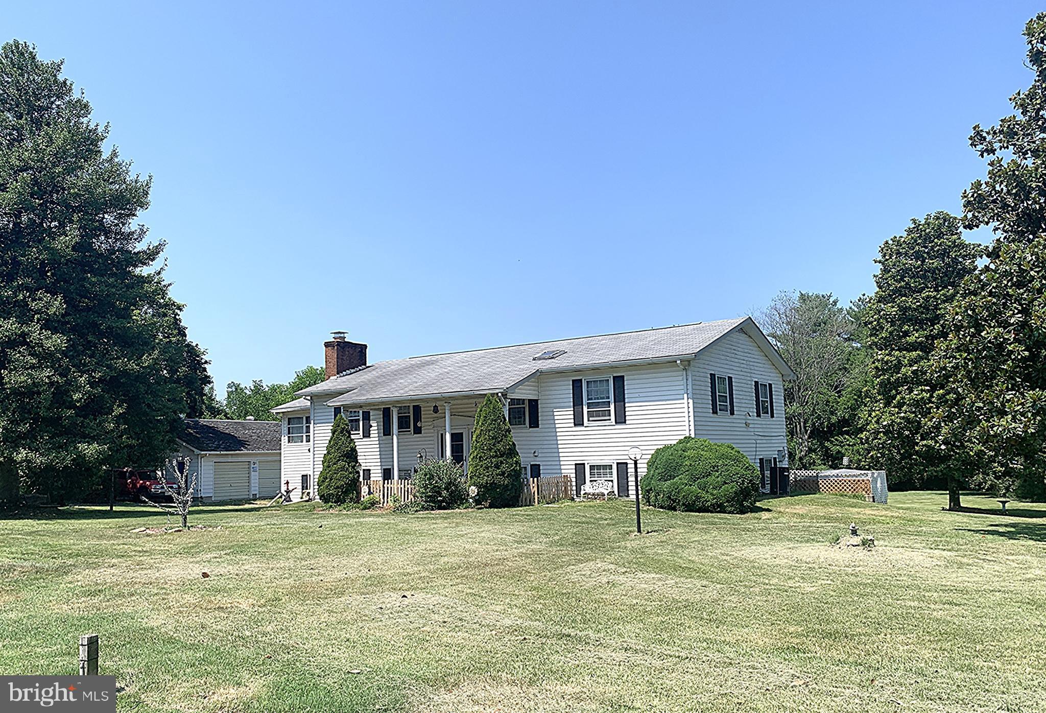 Located in the small Eastern Shore town of Fairlee, this spacious Bi-level sits on 1.65 acres of cleared land, just a short 10-minute drive to both Chestertown and Rock Hall. The home offers 3 bedrooms and 2 bathrooms, with a finished lower level for additional living space. A large sunroom with cathedral ceilings and walls of windows is the heart of the home, filling the space with natural light. Enjoy cooking in the updated kitchen with stainless steel appliances and serving meals in the separate dining room.

Outdoor living is a highlight with an enclosed back porch, decks on both the first and second floors, and plenty of open yard space. Additional features include two fireplaces, a dedicated laundry room, and a shed for storage. A detached 3-bay garage provides ample room for vehicles, hobbies, or workshop space. This property combines comfortable living with generous space inside and out, all in a convenient location close to towns and the water.