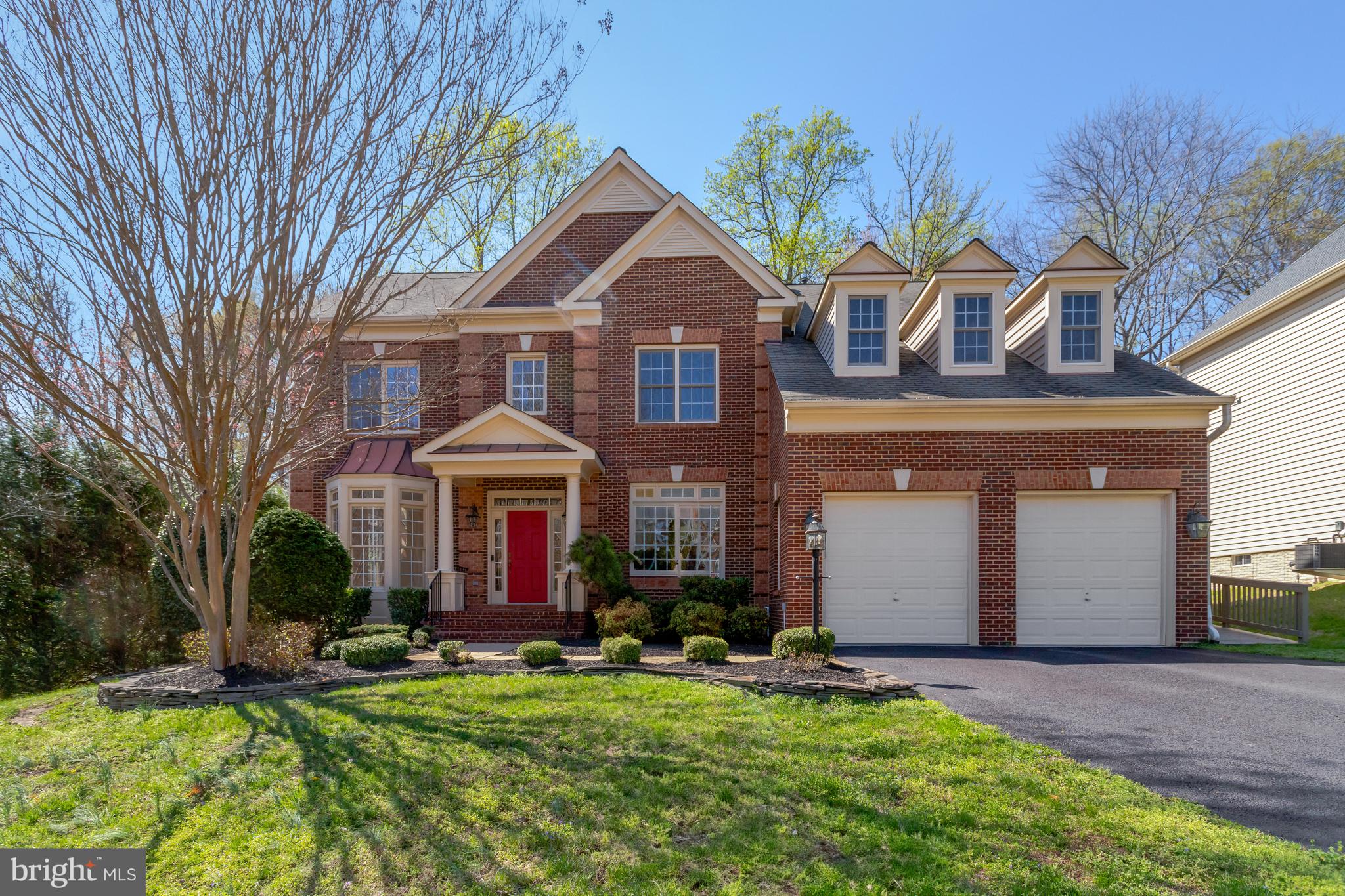 Welcome to 8608 Monacan Court, a sophisticated and elegant home with fabulous curb appeal, located in the quiet Monacan Estates community. Offering the perfect combination of generous interior spaces and surrounding natural beauty, this 5 bedroom 5 1/2 bathroom residence is located on a cul-de-sac and backs to parkland, maximizing both privacy and peaceful views. Step inside to a light and bright interior featuring hardwood floors, large windows throughout, and classic architectural details. The grand two-story family room steals the show with soaring ceilings, elegant Palladian windows, and a gas fireplace with natural stonework. The gourmet kitchen, featuring granite countertops, a breakfast bar, and a spacious center island is the heart of the home, perfect for both cooking or entertaining. Enjoy quiet moments or casual dining in the adjoining breakfast room, with easy access to the patio and serene backyard spaces. In addition, the main level features a formal living room, an elegant dining room, front and back staircases, and a versatile fifth room that can be used as an office or MAIN LEVEL BEDROOM with an en-suite bathroom, offering maximum flexibility to suit your lifestyle. Completing this level is an expansive laundry room with direct access to the garage -- where a 220V outlet is ready to power your EV of choice. For added convenience, a separate ramp leads to the front of the house. Upstairs, the primary suite serves as a private retreat, featuring a sitting area, two large walk-in closets, an en-suite bathroom complete with a dual head walk-in glass shower, a soaking tub, and double vanities. Three additional bedrooms on this level include spacious closets and bathrooms, providing comfort and convenience for family and guests. The lower level is designed purely for entertainment and relaxation, featuring an impressive recreation space connected to a dedicated media room, sleek wet bar, and versatile flex space --perfect for a home gym, game room or guest retreat. With easy walk-up backyard access, this level has ideal potential for an au-pair or in-law suite. To top it off, new HVAC systems (2023 and 2020) ensure year round comfort and efficiency. Conveniently located near parks, schools, and shopping, with fast access to major commuting routes, this timeless home offers the best of both luxury and ideal living. Don’t miss the opportunity to make this exceptional property yours!