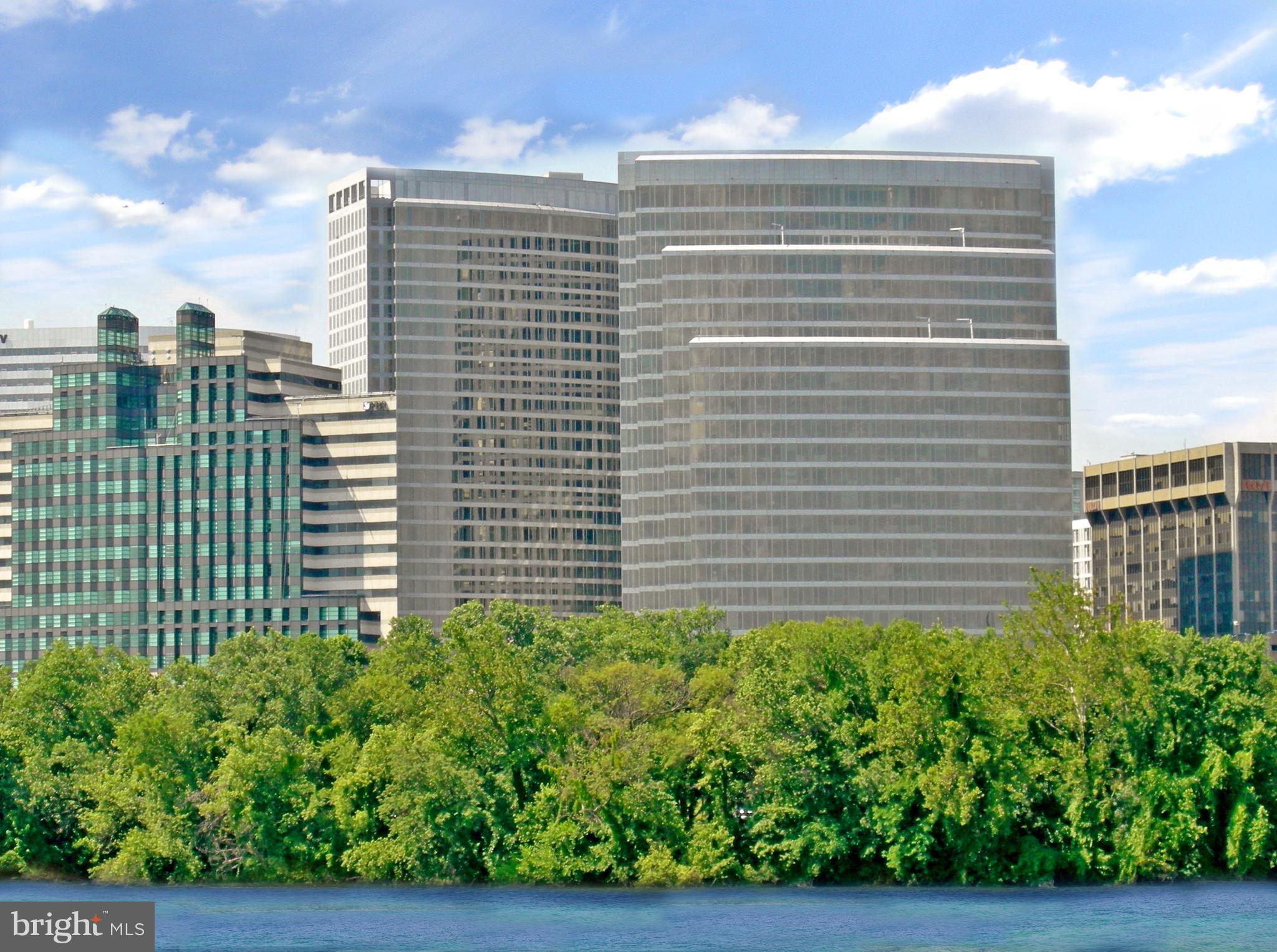 Beautiful, stunning, and rarely available 24th floor penthouse  for sale at Waterview with spectacular views of Georgetown and the Potomac River from every window.  This contemporary-style 1525 sq. ft.  two bedroom, two and a half bath condominium abounds with quality and luxury details including a built-in study nook, brand new porcelain tile flooring and an entirely new renovated kitchen with solid wood custom cabinets, Miele appliances and show-stopping quartz waterfall counter tops.  Other features of this immaculate property include a gas range, built-in refrigerator, convection microwave and warming drawer, Bosch washer and dryer, marble bathrooms with Wood Mode cabinetry, floor to ceiling windows with privacy shades, and a tandem parking space for two cars in the underground garage.  Amenities include a residents lounge, 24/7 concierge services and an on-site property manager.  The Meridien Hotel occupies the first twelve floors of the building, and residents enjoy access to the facilities and services of the hotel including room service and the fitness center.  The roof top terrace on the 31st floor, exclusively for condominium residents, offers the opportunity to grill outdoors while taking in the magnificent world-class panoramic views.  Built in 2008, Waterview is a contemporary style building located in the heart of Rosslyn and designed by internationally renowned architects Pei Cobb Freed & Partners. The recipient of numerous design awards over the years, Pei Cobb Freed stand at the forefront of modern architecture, and are best known for their dramatic expansion and modernization of the Louvre in Paris.  Located at the foot of Key Bridge, the property is ideally located just steps from Rosslyn metro station, less than half a mile from Georgetown and downtown DC, and just 10 minutes to Reagan National Airport.