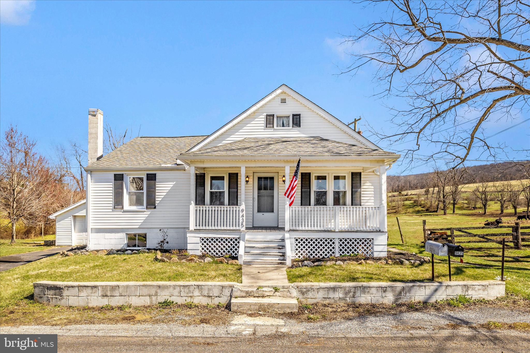 Hometown country classic surrounded by beautiful Middletown valley rolling hills and farm fields.  Fully renovated 3 - bedroom first floor living with freshly refinished hardwoods, replacement windows, gutter guards, new kitchen countertops with a new hot water heater.   All of this and new lighting throughout with a gorgeous chic full serene bathroom.   The laundry is conveniently located on the main level tucked behind gorgeous new barn doors.  Central air and forced air heat throughout.   Country sitting porches on the front, the back and the side! Access to the large back covered deck from the kitchen makes for the perfect morning coffee sunrise and evening grilling enjoying peaceful sunsets.  A 2 - car garage with storage and serene stream add to the ambiance of this home.  An additional shed located behind the garage is yours to store deck furniture, tools or whatever your heart desires!  The basement houses the oil tank and well equipment and is accessed from outside via the bilco doors.   Across from the home is a paddock sized additional fenced area - this area is large enough to accommodate 4H interests or use it for your own hobbies and activities.   Our Seller has lovingly prepared this home for market and we kindly request that you wear provided booties while on the newly refinished hardwood floors.  AGENTS - please see additional notes in Agent section, we have provided lots of details.