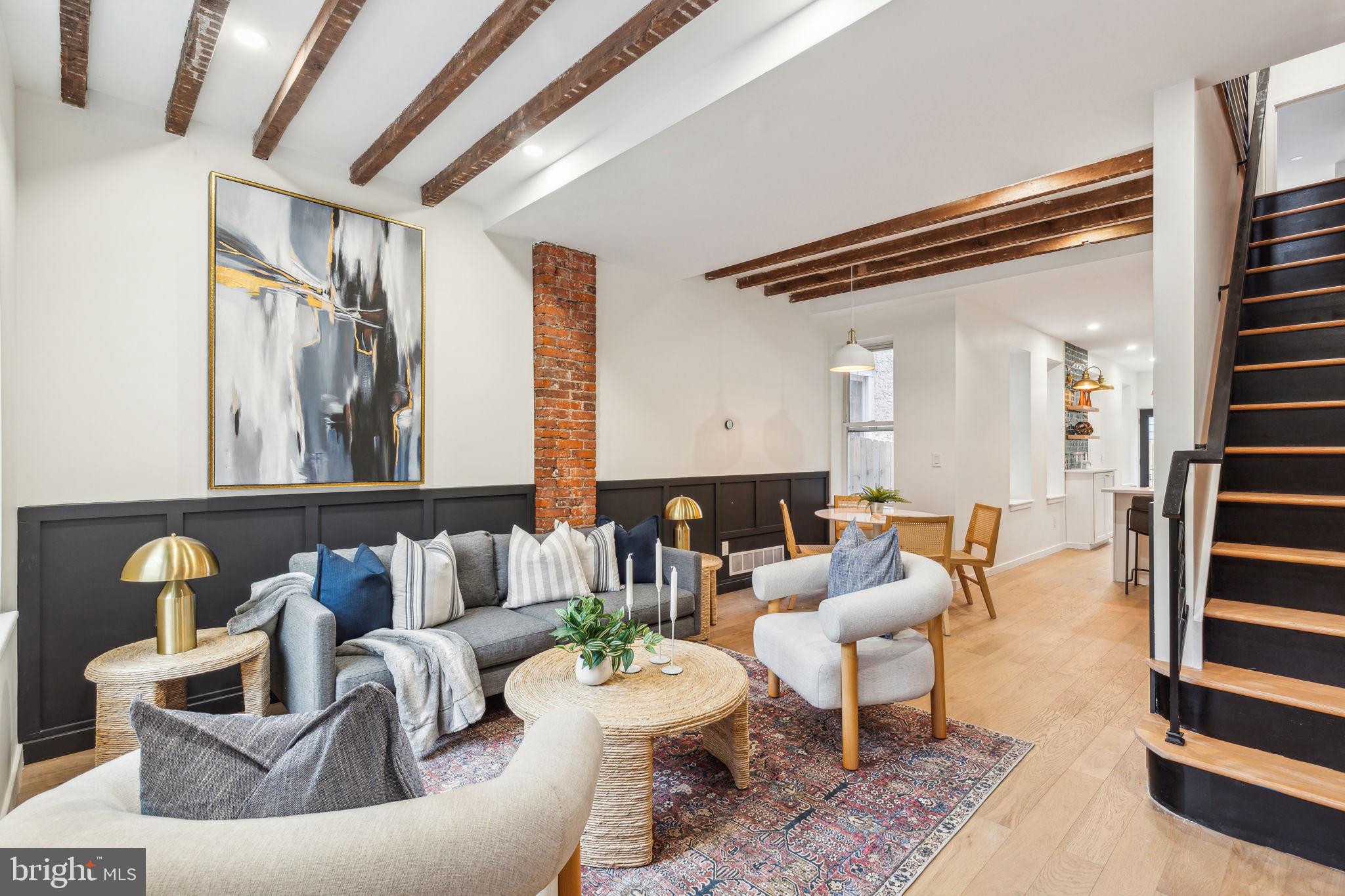 Welcome to 637 Belgrade Street, a beautifully renovated brick-front home situated on a fantastic block in the heart of Fishtown with a pending 10 year tax abatement!This move-in ready residence seamlessly blends original charm with modern upgrades, offering 3 spacious bedrooms, 1.5 bathrooms, and a private outdoor space perfect for relaxing or entertaining.

Step inside to an open-concept living and dining area featuring wide plank white oak hardwood floors, exposed brick, recessed lighting, and reclaimed wood details that add warmth and character throughout. The bright and stylish kitchen is equipped with quartz countertops, modern shaker cabinetry, a designer tile backsplash, and a full stainless steel appliance package.

Just behind the kitchen, you’ll find a convenient first-floor powder room and a washer/dryer closet for added functionality. Step outside to the fenced-in backyard, ideal for gatherings, gardening, or pets.

How about the custom reclaimed wood “secret door” to go downstairs to the large unfinished basement. Perfect for extra storage,  a potential at home speakeasy, or an extra bonus living area. 

Upstairs, the second floor offers three generously sized bedrooms, including a primary bedroom with ample closet space. The updated full bathroom features a tiled tub surround and brass and moody  accents for a touch of rustic elegance.

Additional upgrades include all new HVAC, electrical, plumbing, windows, and roof—everything has been done for you. A pending 10-year tax abatement adds incredible value to this thoughtfully renovated home.

Located just steps from Fishtown’s best restaurants, coffee shops, bars, and public transportation—637 Belgrade Street is a must-see!