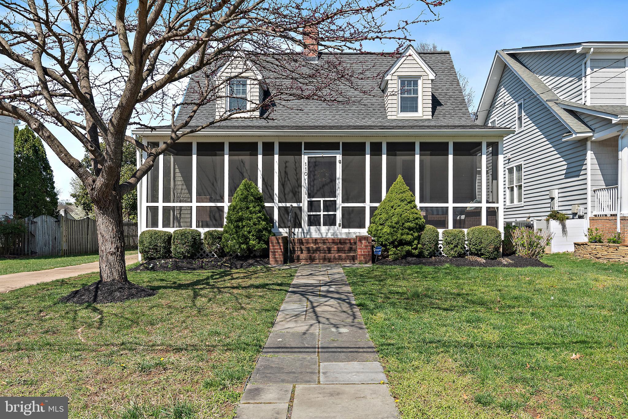 Nestled in the heart of Homewood, on one of the prettiest streets in the neighborhood, this light-filled charming 5 bedroom, 4 bathroom home in Annapolis is just a short distance from downtown. Walk to the library or nearby shops. This property offers an incredible screened-in front porch, hardwood floors, an expansive back deck, flagstone patio, large level backyard, and more. Owners and guests will benefit from a private driveway with room for five vehicles and a detached one-car garage. 

On the main level, you’ll be welcomed by a traditional foyer with a coat closet, a living room with cozy gas fireplace, a dining room that is next to an all-white kitchen with stainless steel appliances that looks into an airy den that takes you to the back deck, patio, and large yard. On this main level, you will find a large bedroom with a double closet and an en suite bathroom. 

The upper level is where you will find the primary bedroom with 5 large windows offering the space loads of natural light. This remarkable 2022 addition also has a wonderful walk-in closet with a built-in dresser and two large windows, as well as an en suite bathroom with more windows allowing natural light to pour in, a double vanity with marble countertop, a soaking tub, a spa shower with glass surround, stackable Bloomberg washer and dryer, and water closet. On this upper level, you will also find two additional bedrooms and another full bathroom.

The finished lower level offers yet another bedroom, full bathroom, media room/den, an office/workspace, and a utility room with a dedicated laundry area with full-sized washer and dryer. You’ll also find a full-sized refrigerator. This home is built to make memories for years to come. Please refer to the special features sheet for detailed information.
