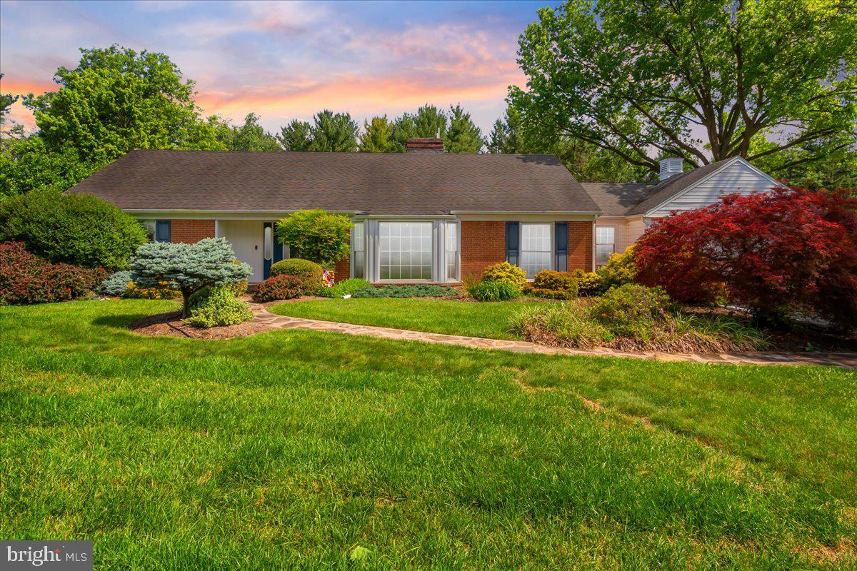Fountainhead Classic!  Gorgeous and Well Maintained.  
Walk in the front door to your beautiful large foyer with slate flooring, closets, and room for welcoming furniture.    The living room is very spacious with Fireplace and huge bay window - so much light coming in to this home.  Dining Room also generously sized - bring on that huge table you have.  There is a bonus room between the dining room and the door to the garage - currently used as an office (great use) or mudroom, craft space, or whatever you need it for?   There is additionally a mudroom/laundry room beside the kitchen with a door to the back deck.   The kitchen was completely remodeled and features high end appliances, gas cooking, island with seating and beverage center - the pics tell the story on this one!   The primary suite is large enough for a king bed, and also consists of a completely remodeled bathroom.  The Second and Third bedrooms are also larger than normal for a rancher of this  .   The hallway bathroom which services the 2nd and 3rd bedroom, again, completely remodeled/upgraded.  As you can see in the photos, Hardwood Flooring Throughout the main level of the home with Tile in Kitchen/Baths.  NO CARPET (except basement)!  Downstairs features a massive entertaining space with large U-shaped bar, pool table (negotiable), TV space, music space, half bathroom, extra kitchen, tons of built in storage.    Outside is a deck to envy, which was fitted with mulitple seating and dining zones.  The flat lush yard is amazing.   The owner's landscaping is meticulous and colorful out front and in the back yard.   There are so many wonderful features in this home you need to see it for yourself.   Schedule your tour today - super nice houses in Fountainhead do not last long.